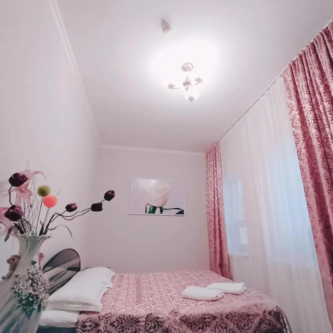 Bed in Altyn-Adam Hotel