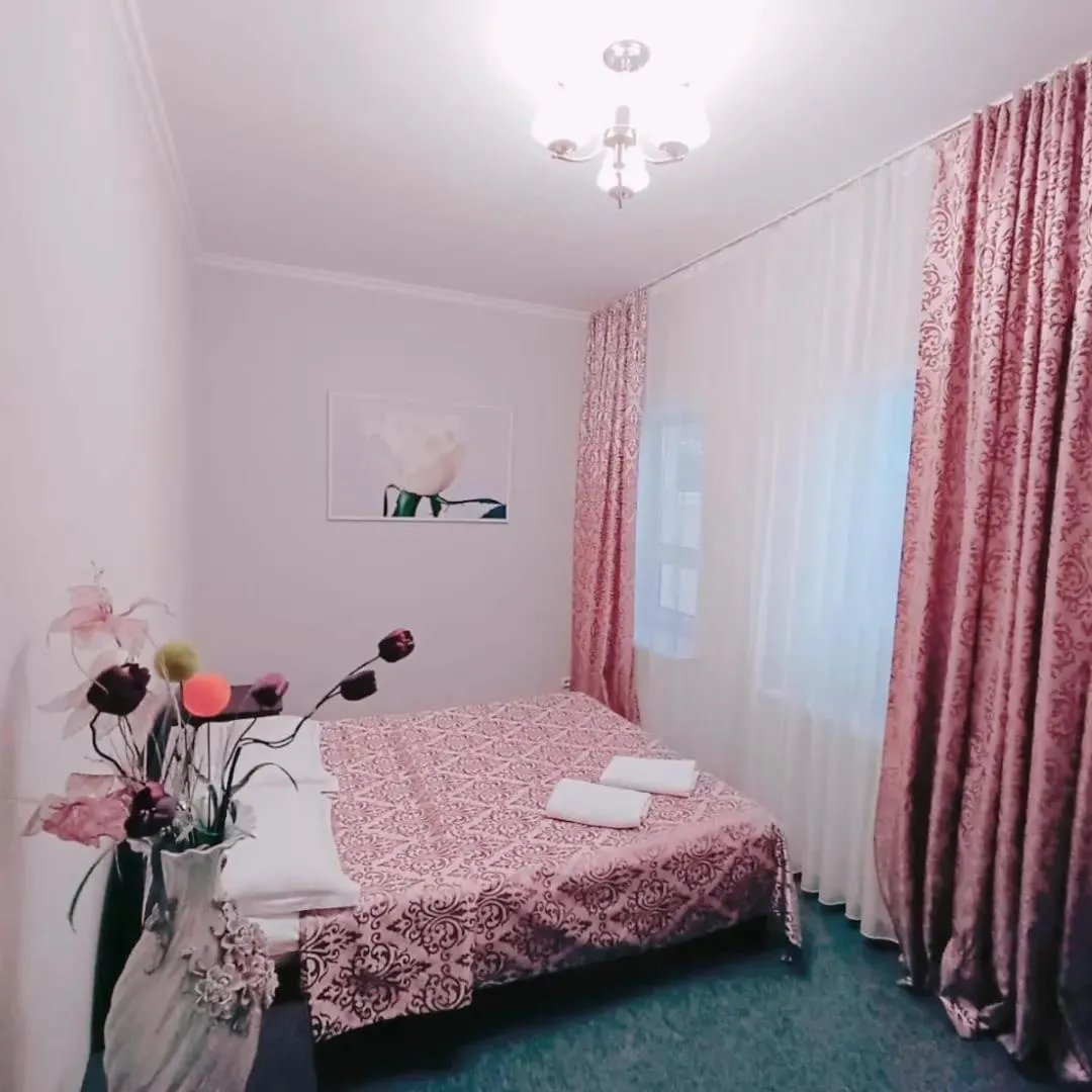 Bed in Altyn-Adam Hotel