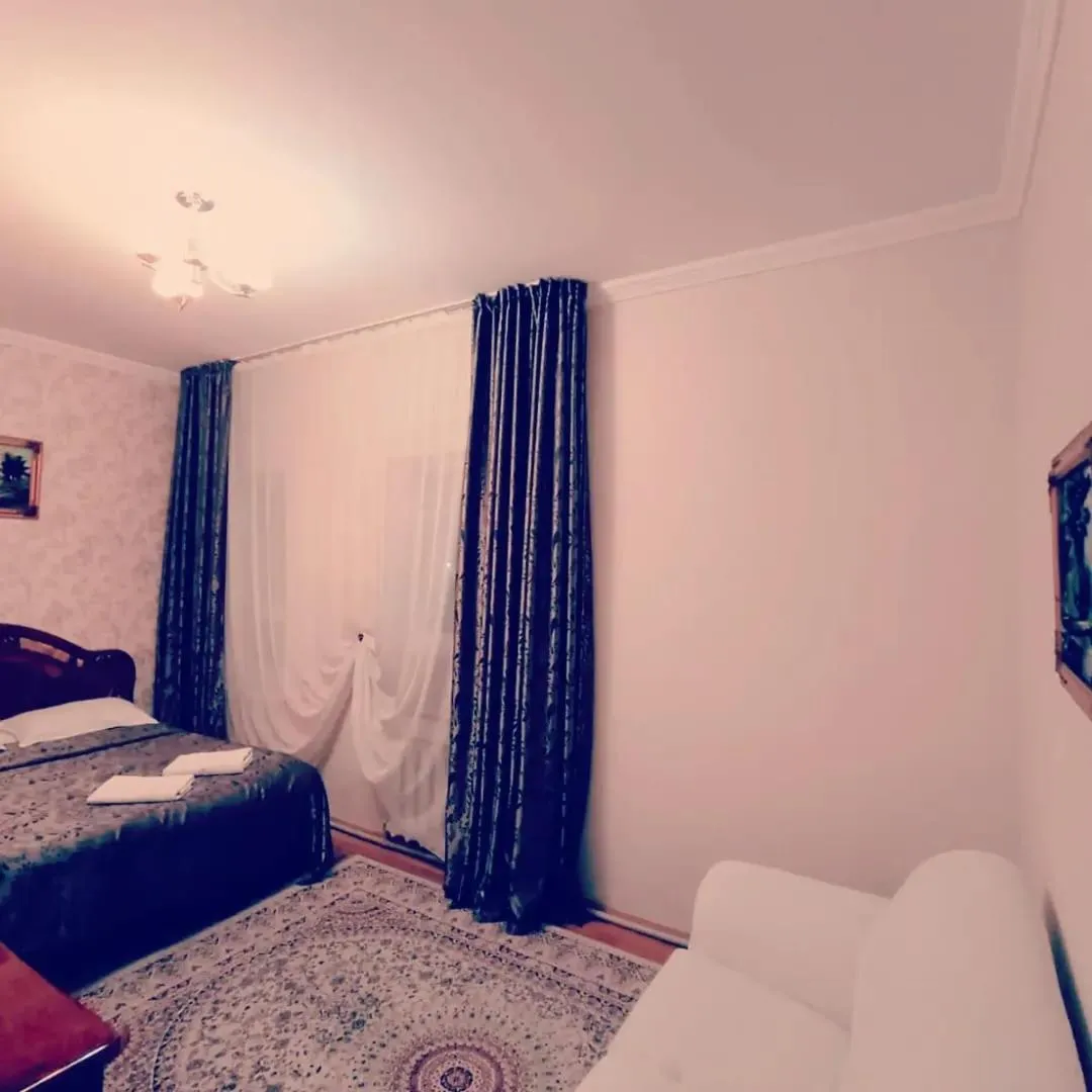 Bed in Altyn-Adam Hotel