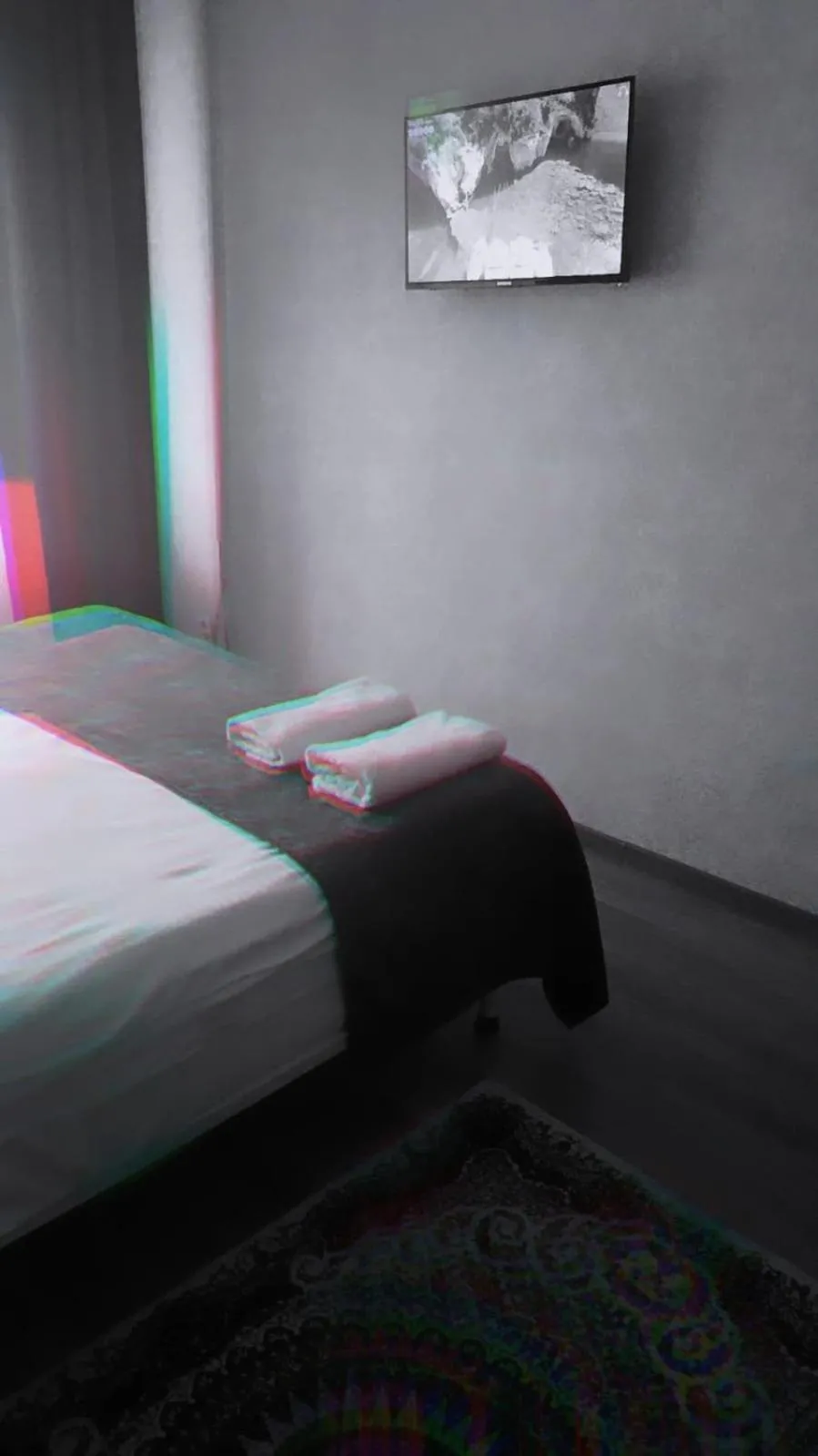 Bed in Altyn-Adam Hotel