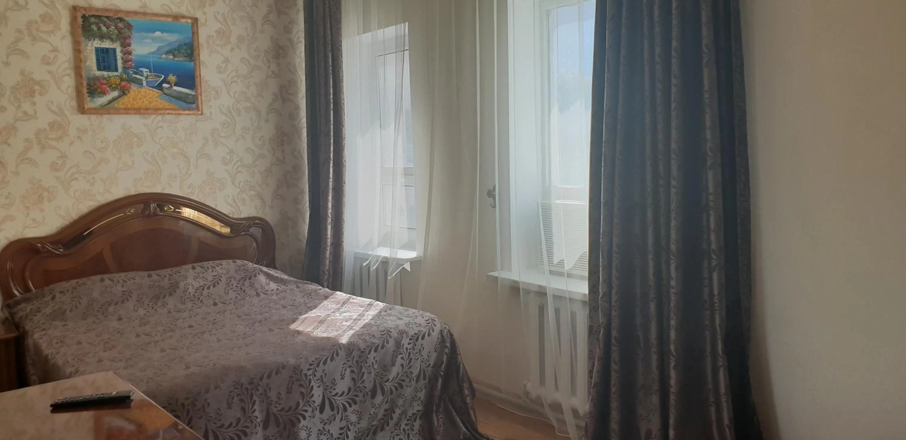 Bed in Altyn-Adam Hotel