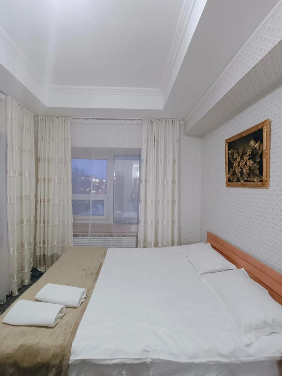 Bed in Altyn-Adam Hotel