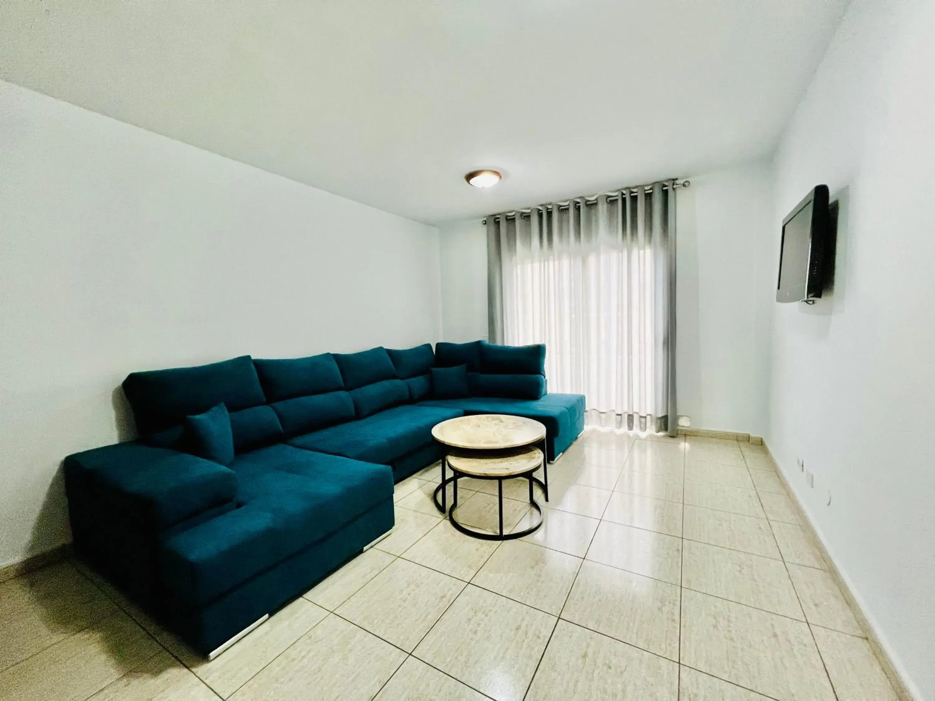 Communal lounge/ TV room in Apartamentos Frontera Communal lounge/ TV room in Apartamentos Frontera