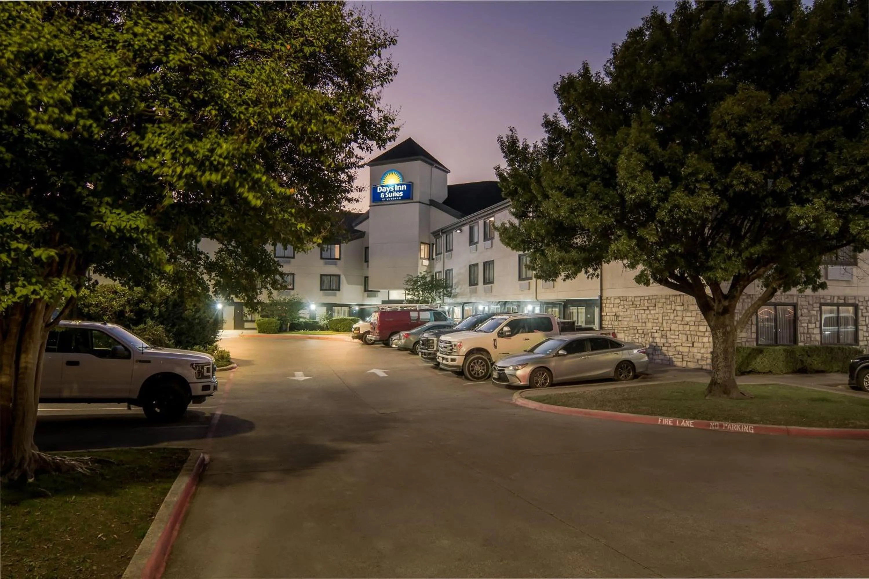 Property building in Days Inn & Suites by Wyndham DeSoto