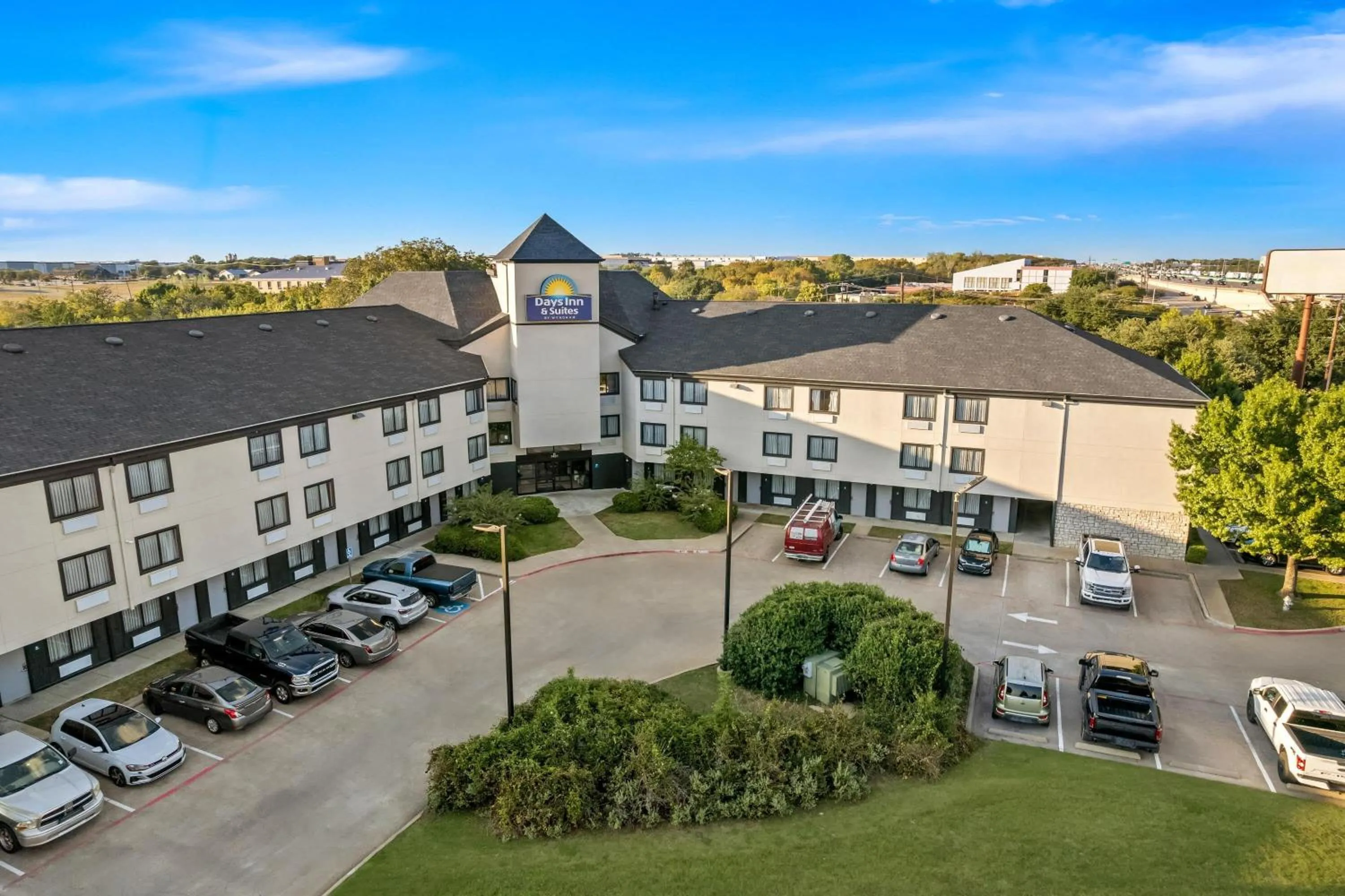 Property building in Days Inn & Suites by Wyndham DeSoto