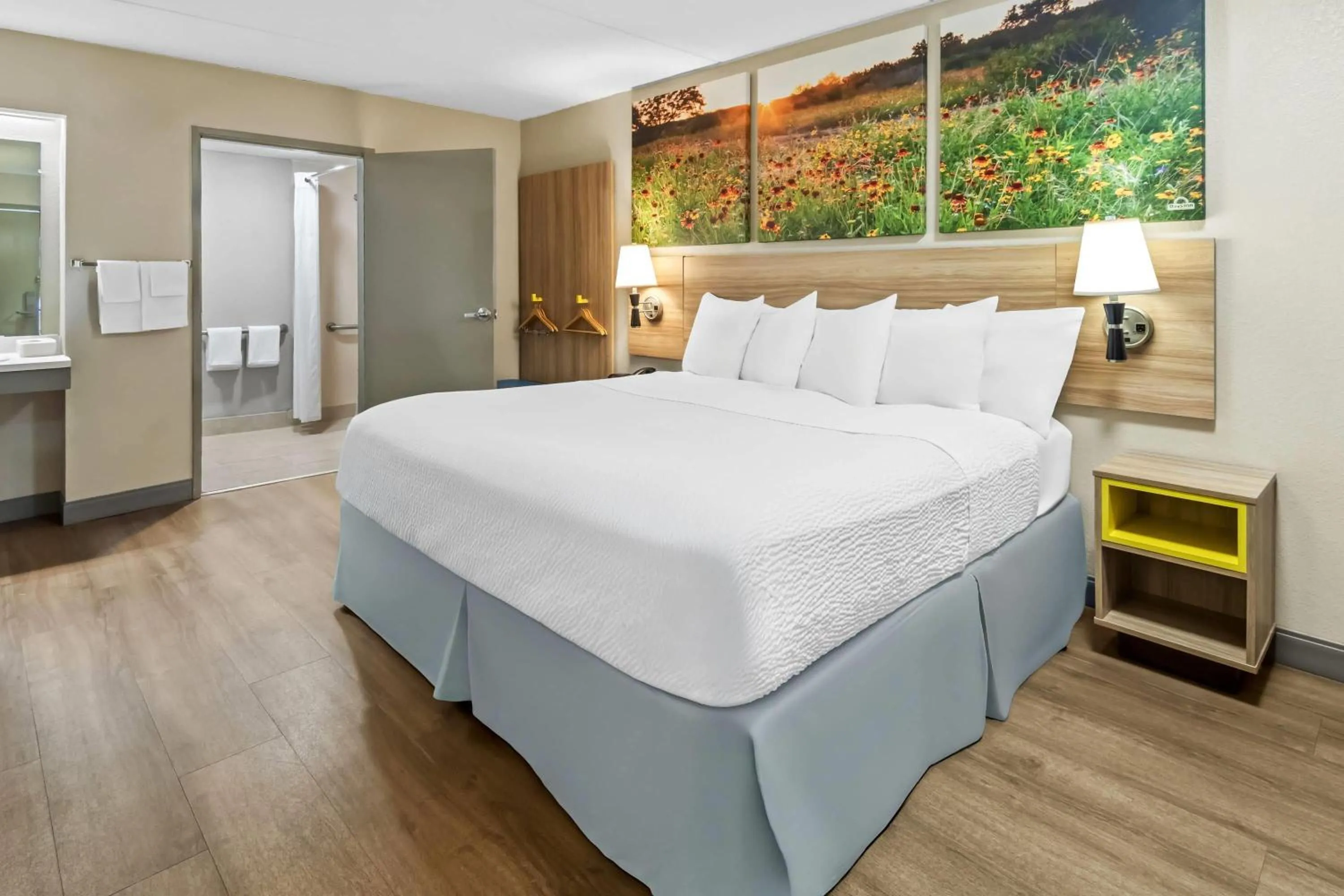 Bed in Days Inn & Suites by Wyndham DeSoto