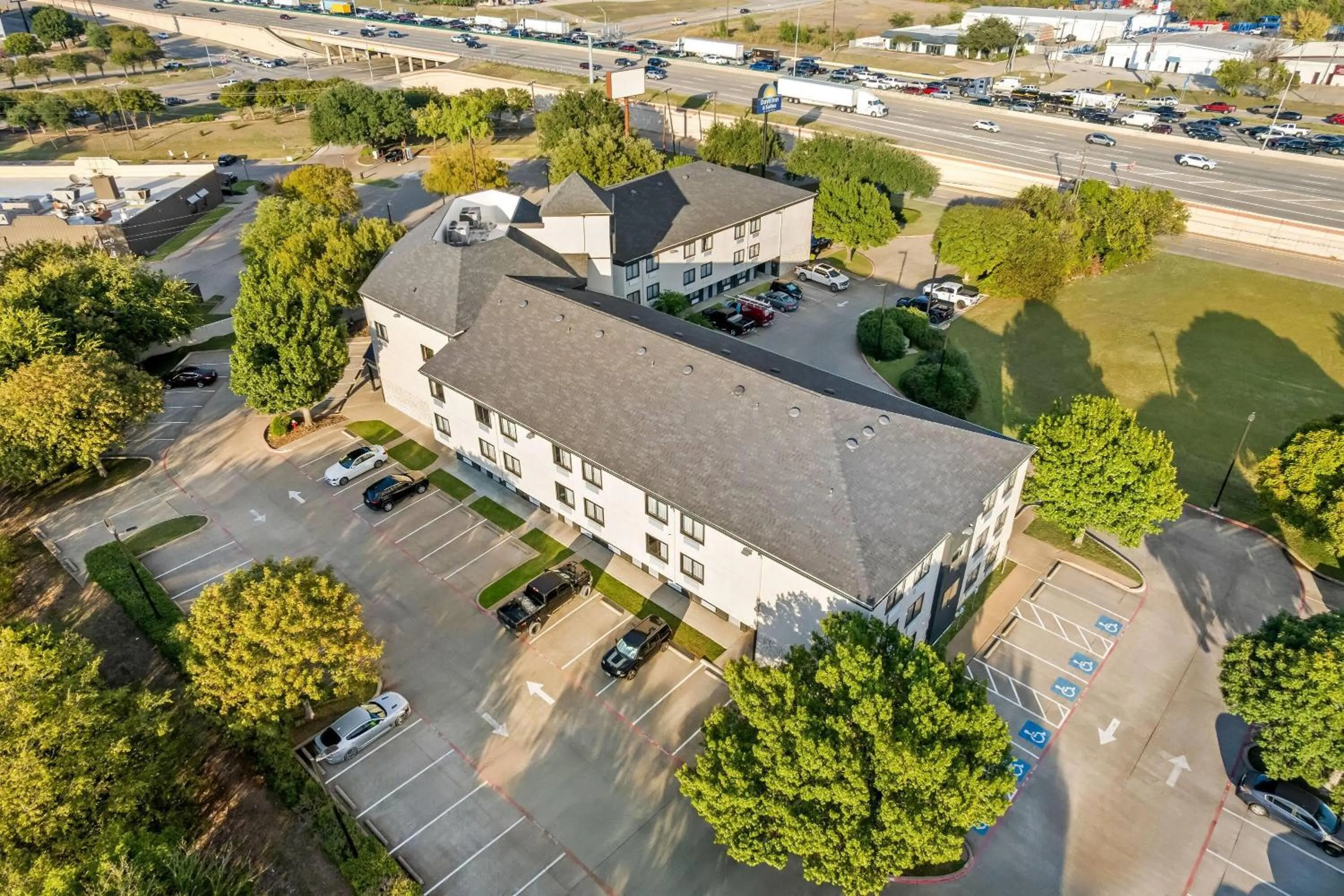 Property building in Days Inn & Suites by Wyndham DeSoto