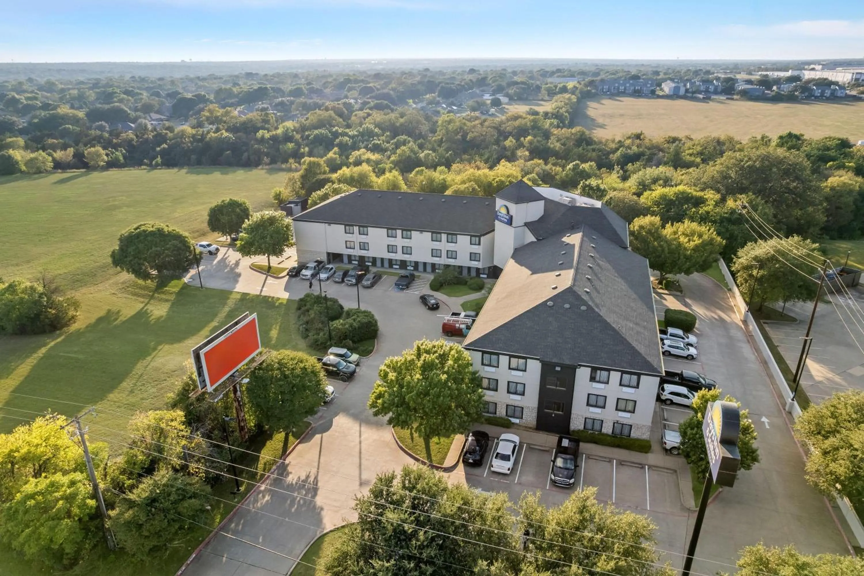 Property building in Days Inn & Suites by Wyndham DeSoto