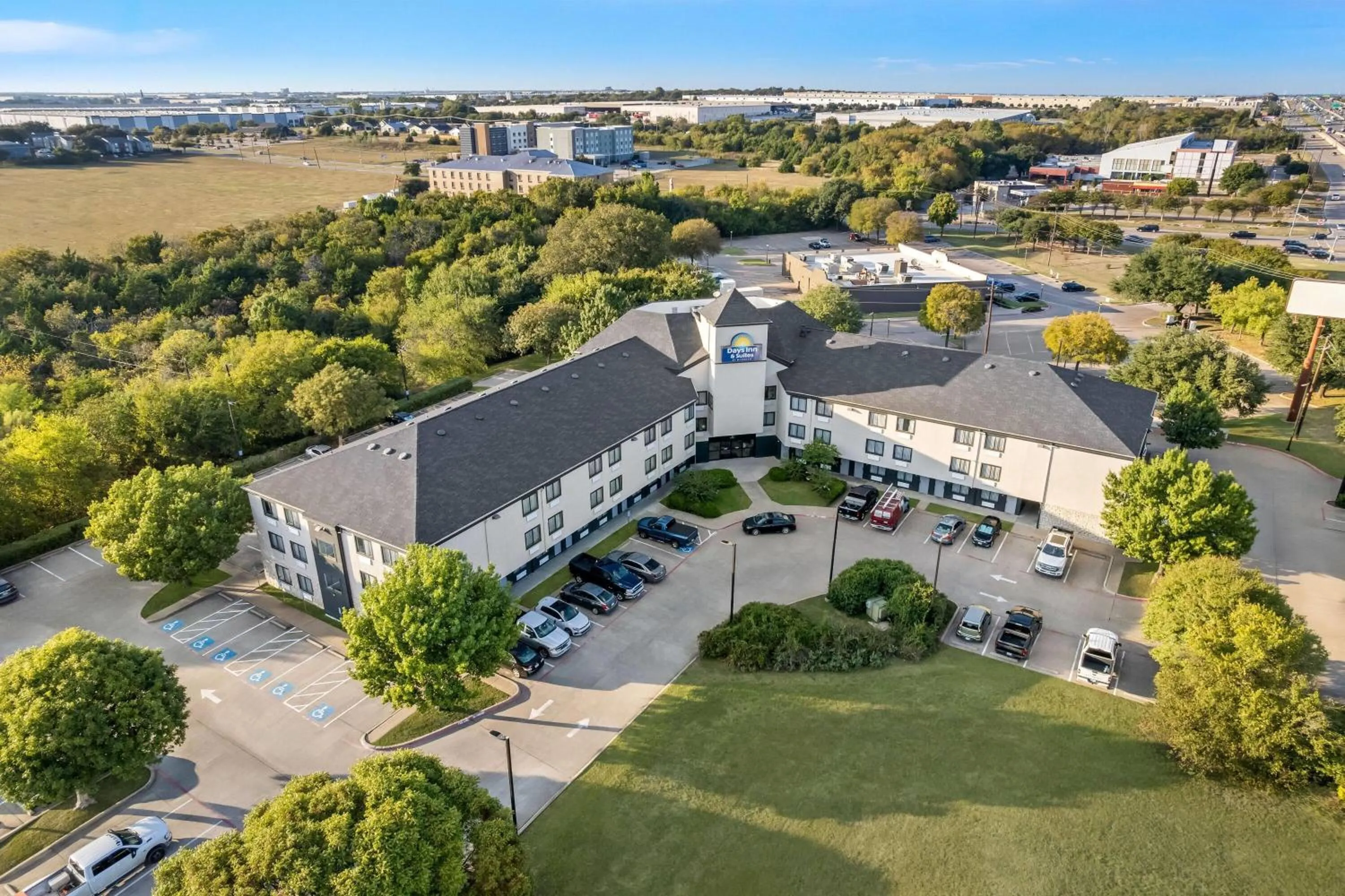 Property building in Days Inn & Suites by Wyndham DeSoto