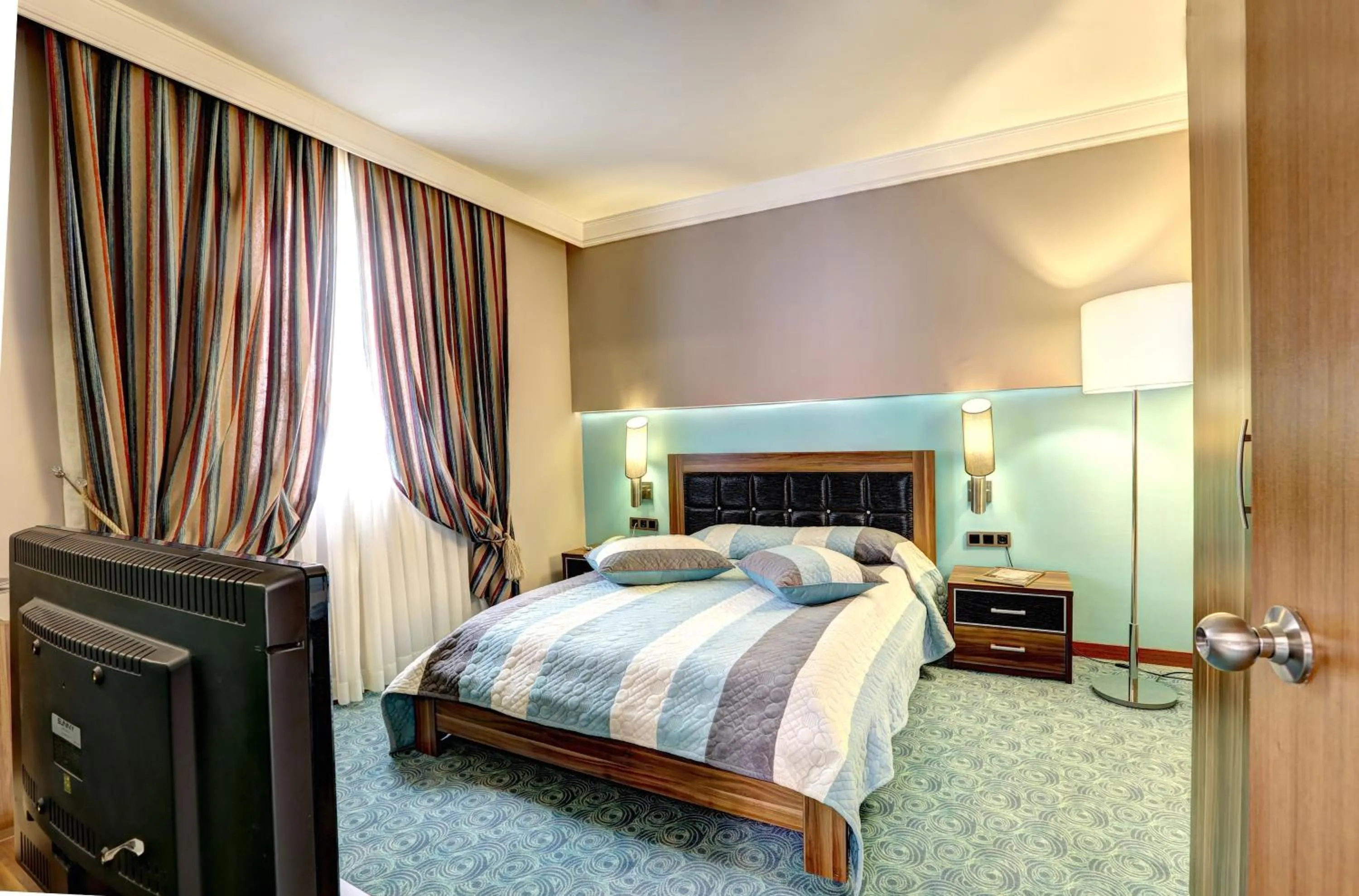 Photo of the whole room, Bed in Suhan Cappadocia Hotel & Spa