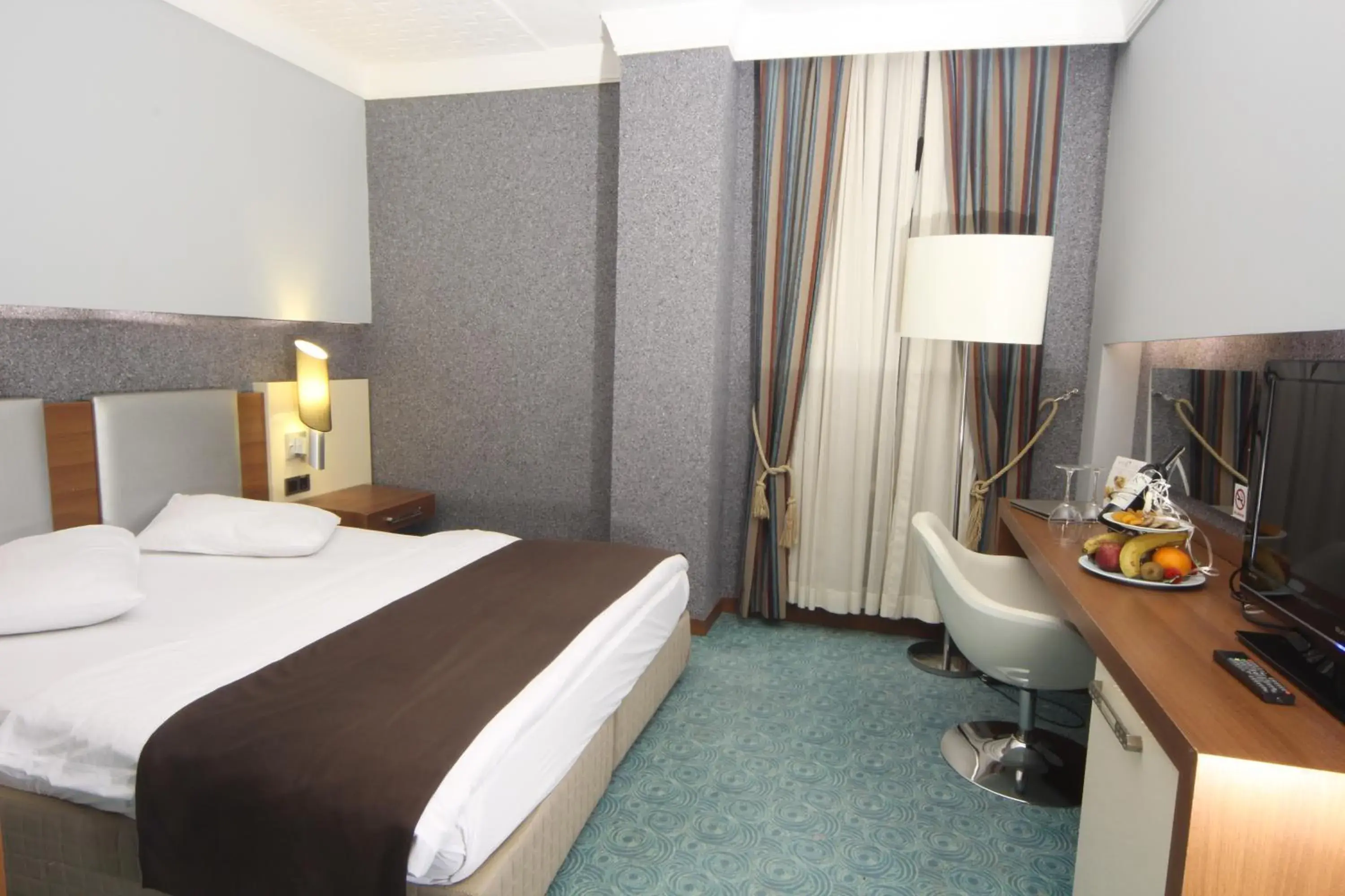 Photo of the whole room, Bed in Suhan Cappadocia Hotel & Spa Photo of the whole room, Bed in Suhan Cappadocia Hotel & Spa