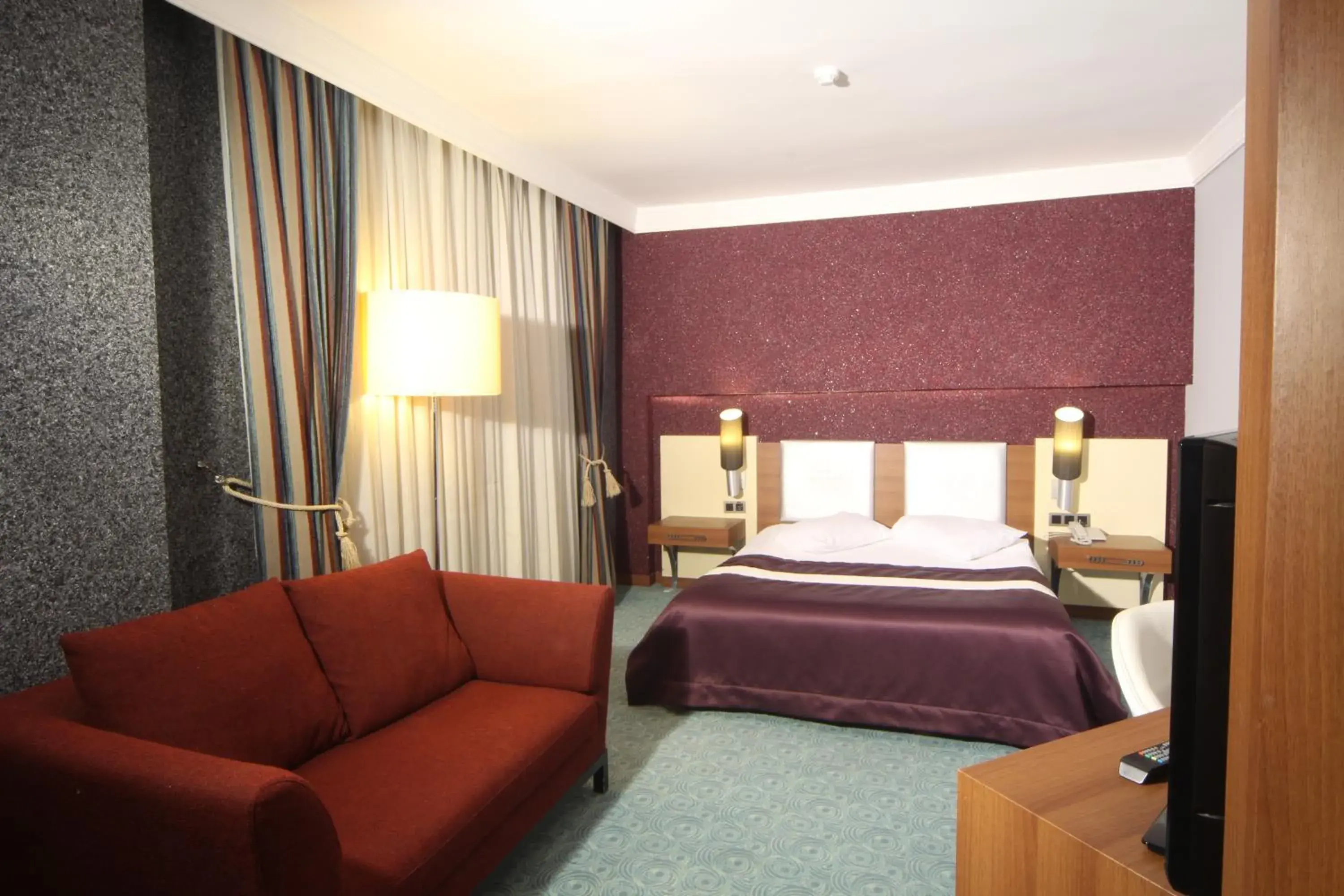 Bed in Suhan Cappadocia Hotel & Spa Bed in Suhan Cappadocia Hotel & Spa