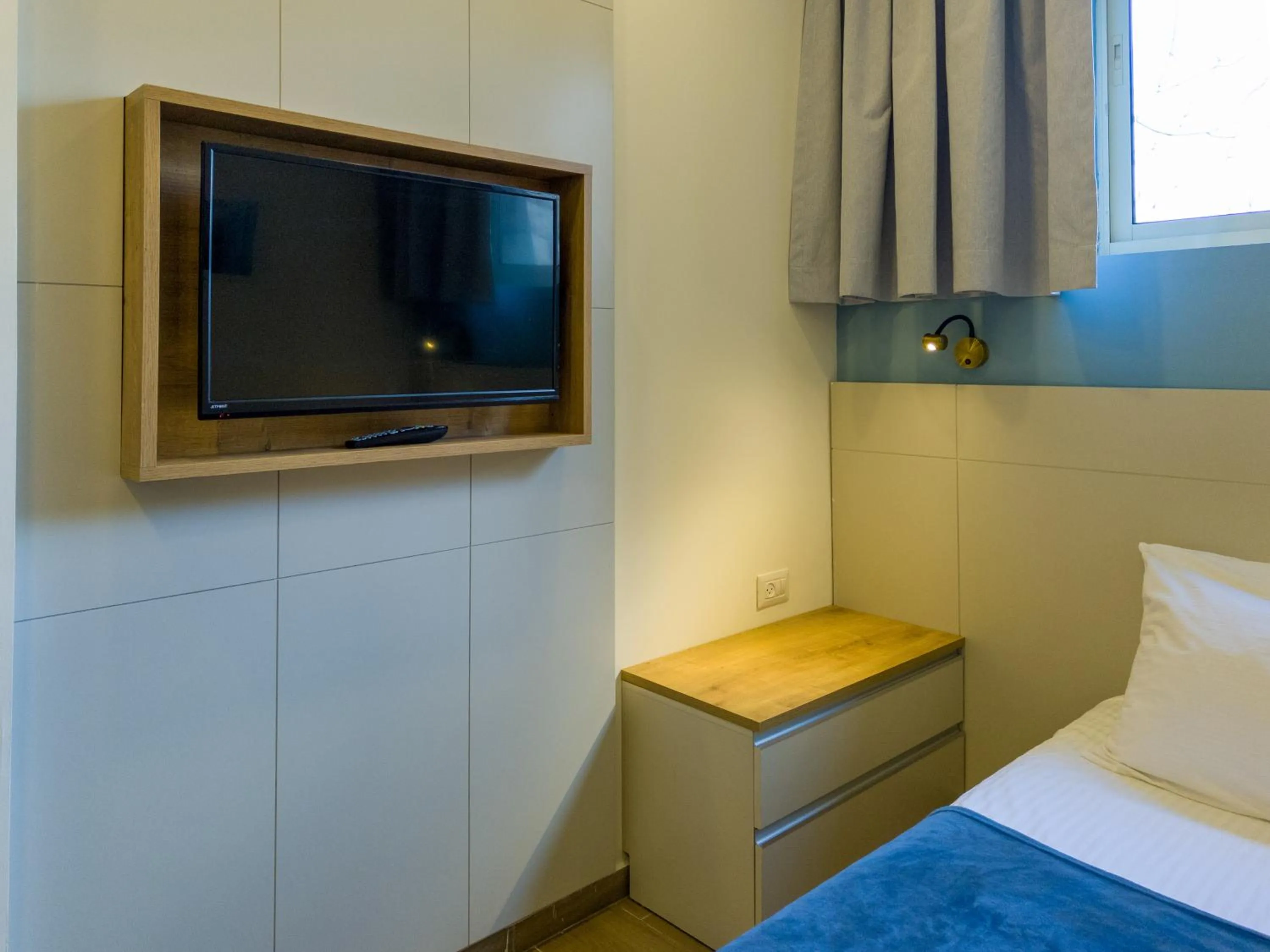 Bed in Shlomtzi Hotel