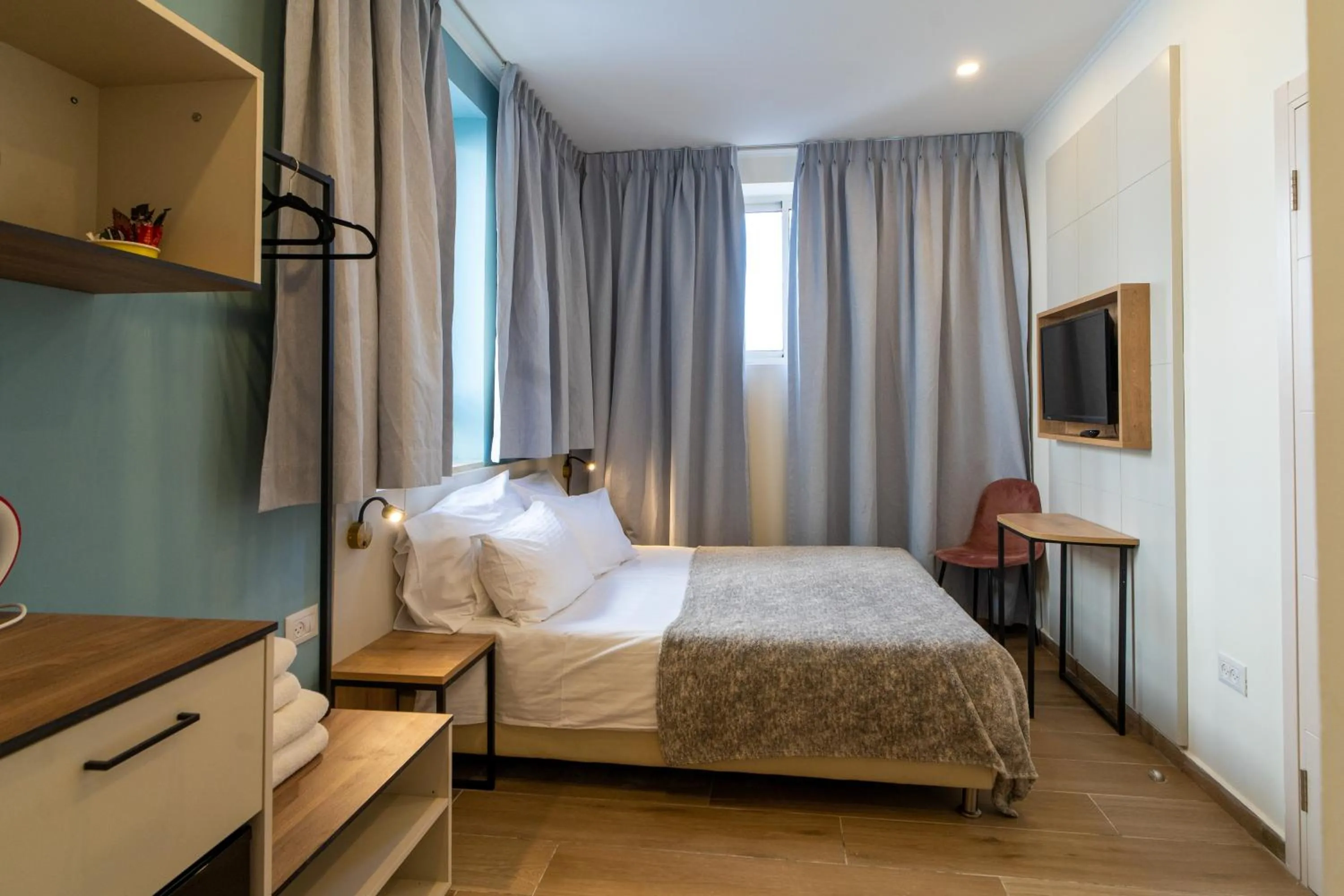 Bed in Shlomtzi Hotel