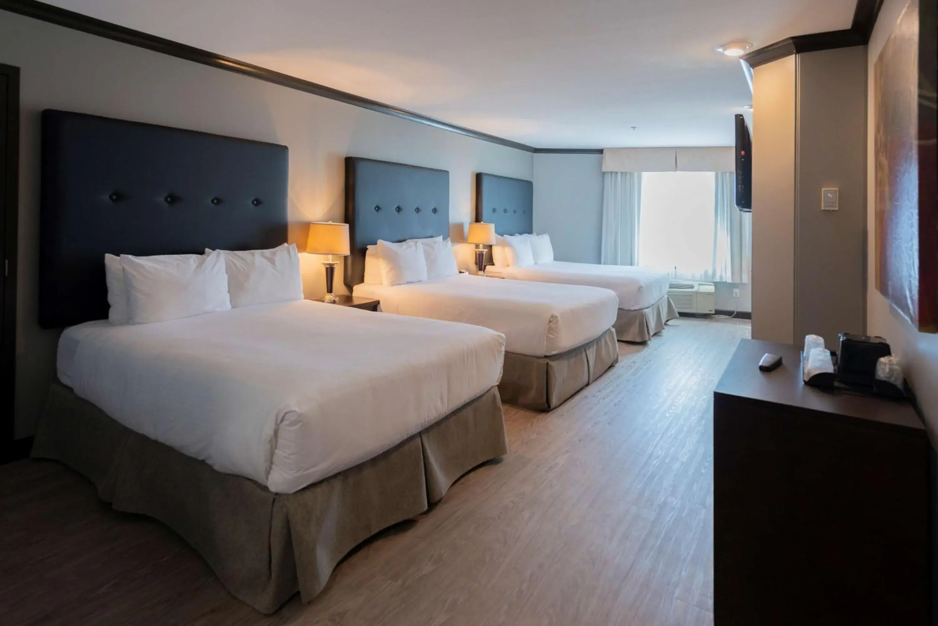 Queen Suite with Three Queen Beds - single occupancy in Prestige Treasure Cove Resort Queen Suite with Three Queen Beds - single occupancy in Prestige Treasure Cove Resort