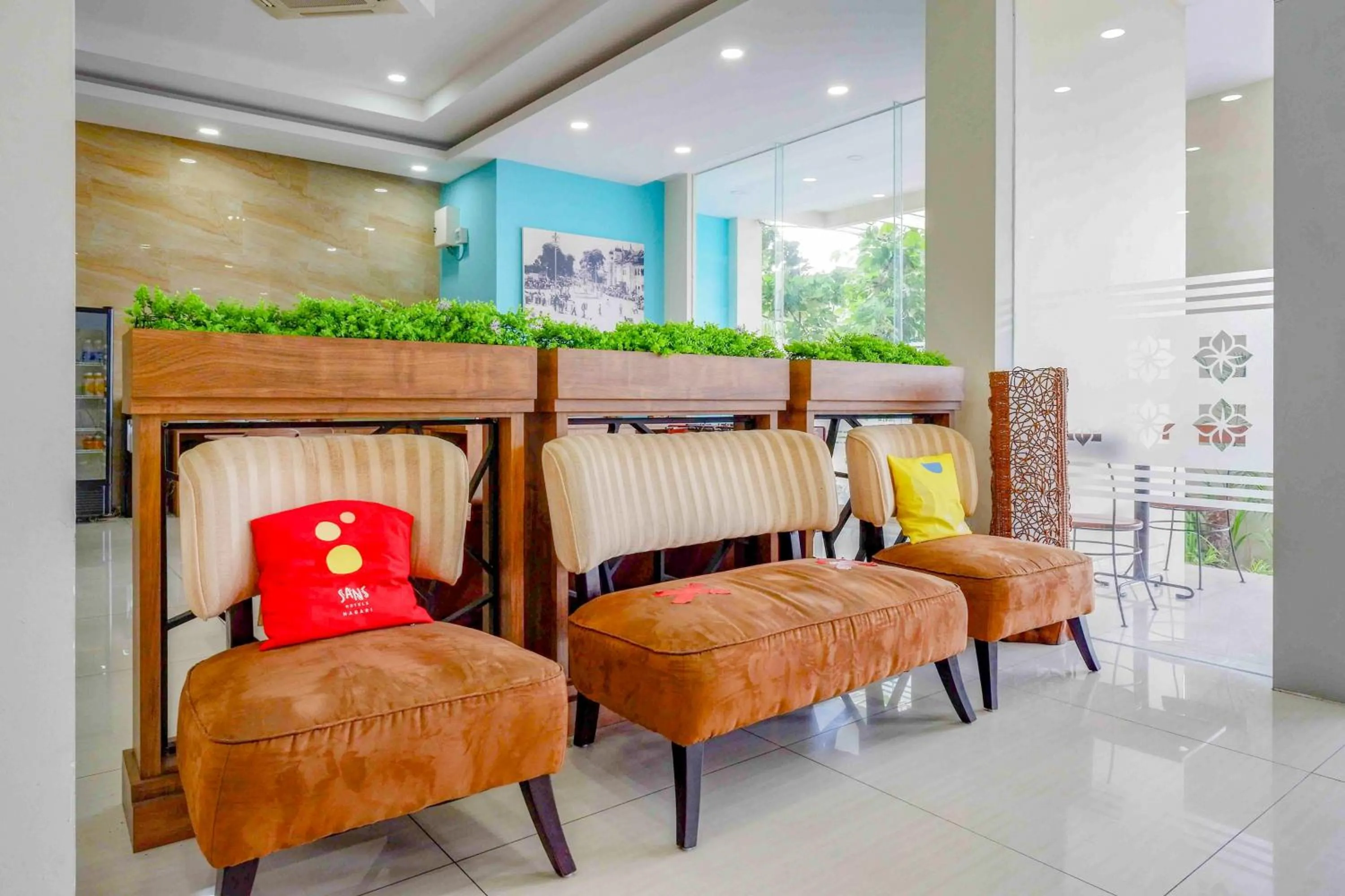 Seating area in Sans Hotel Nagari Malioboro