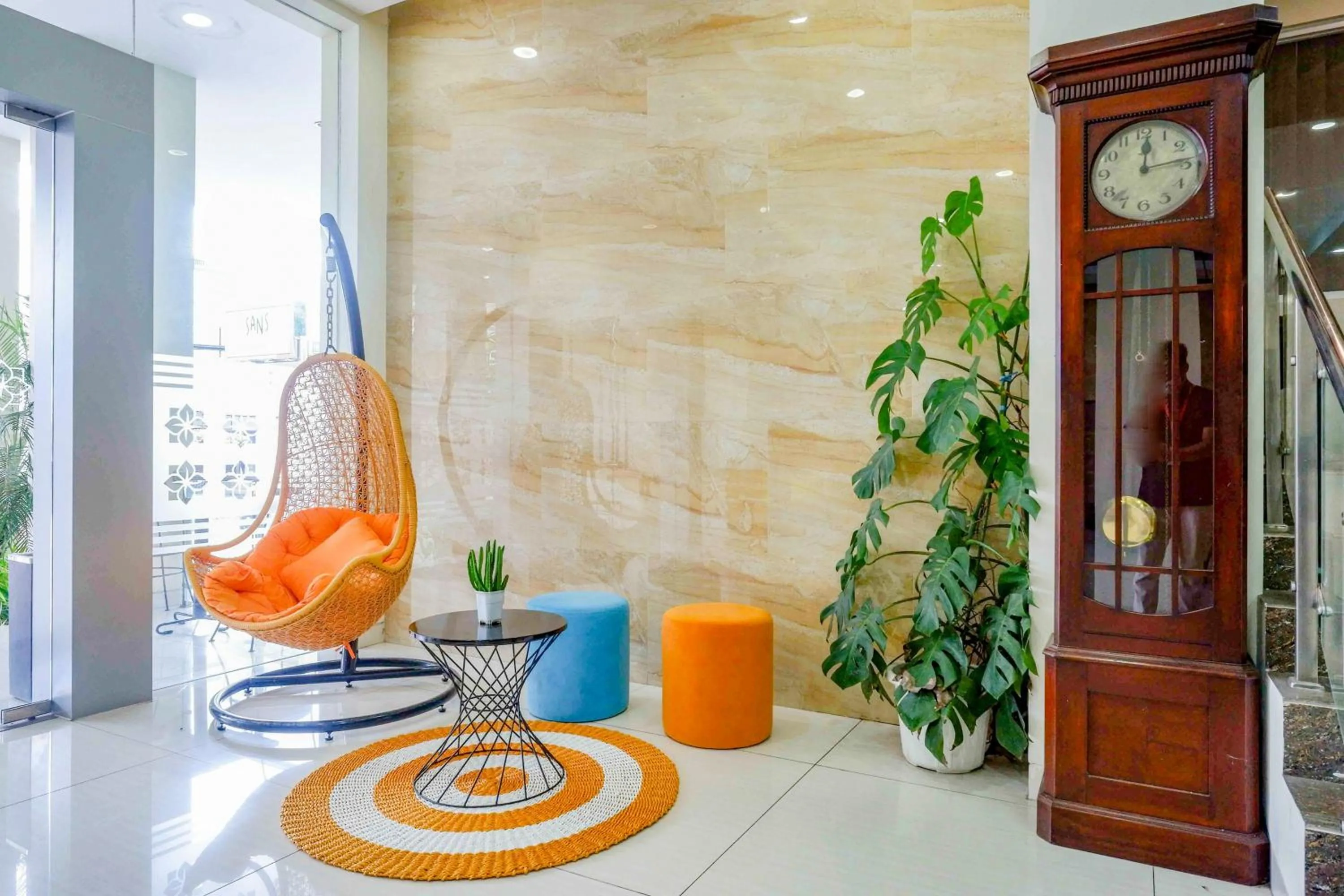 Seating area in Sans Hotel Nagari Malioboro