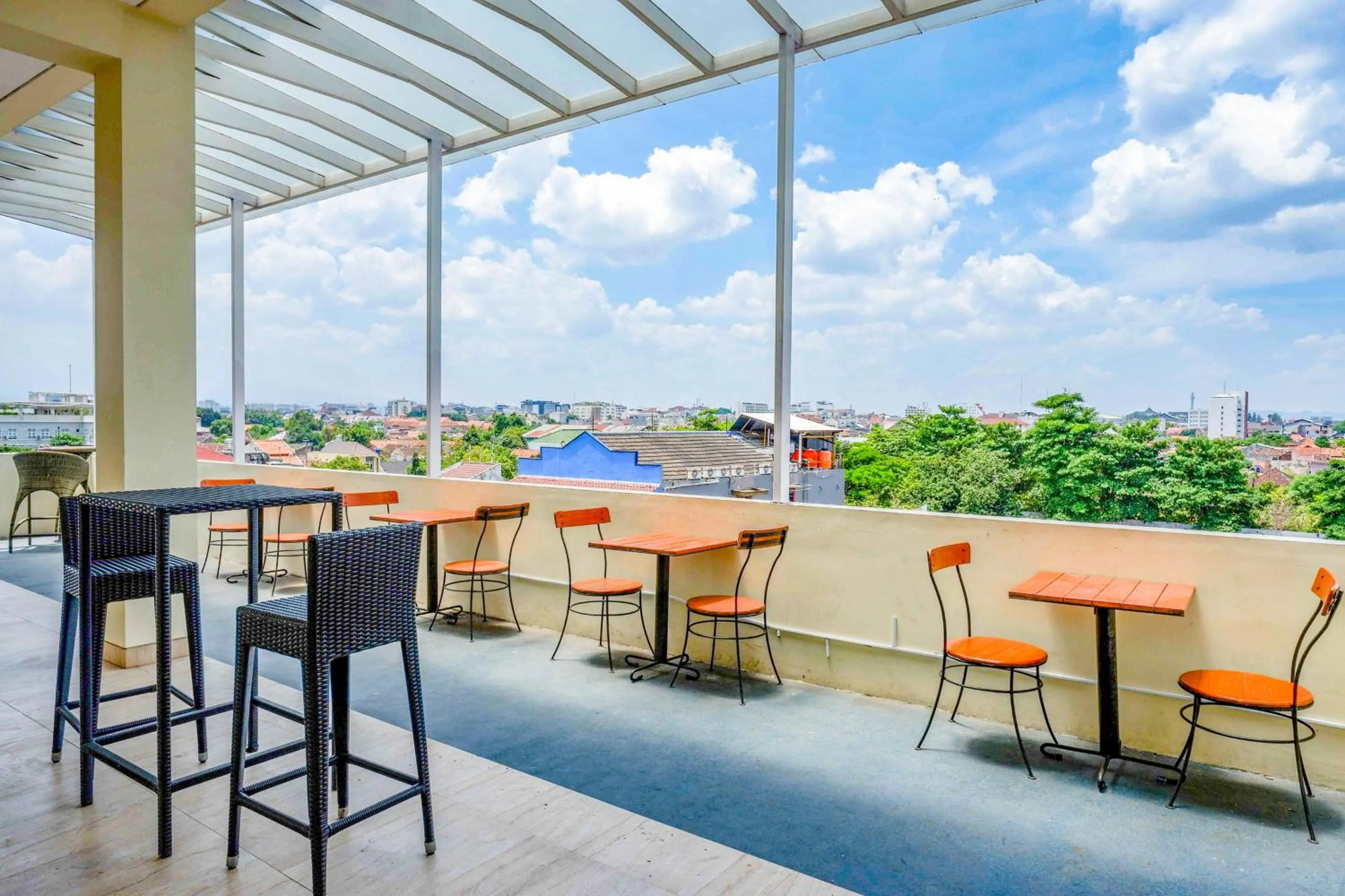 Seating area in Sans Hotel Nagari Malioboro