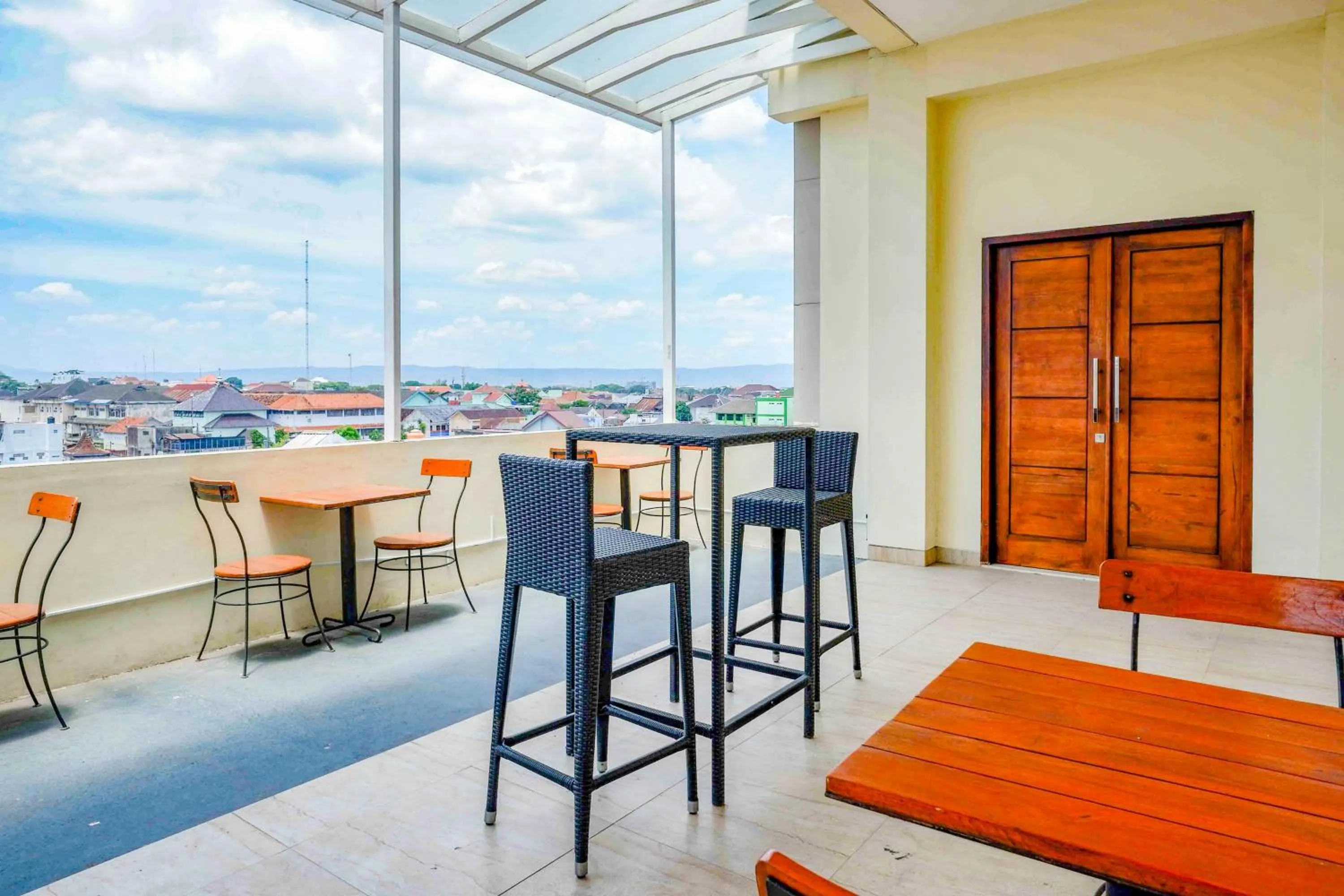 Seating area in Sans Hotel Nagari Malioboro