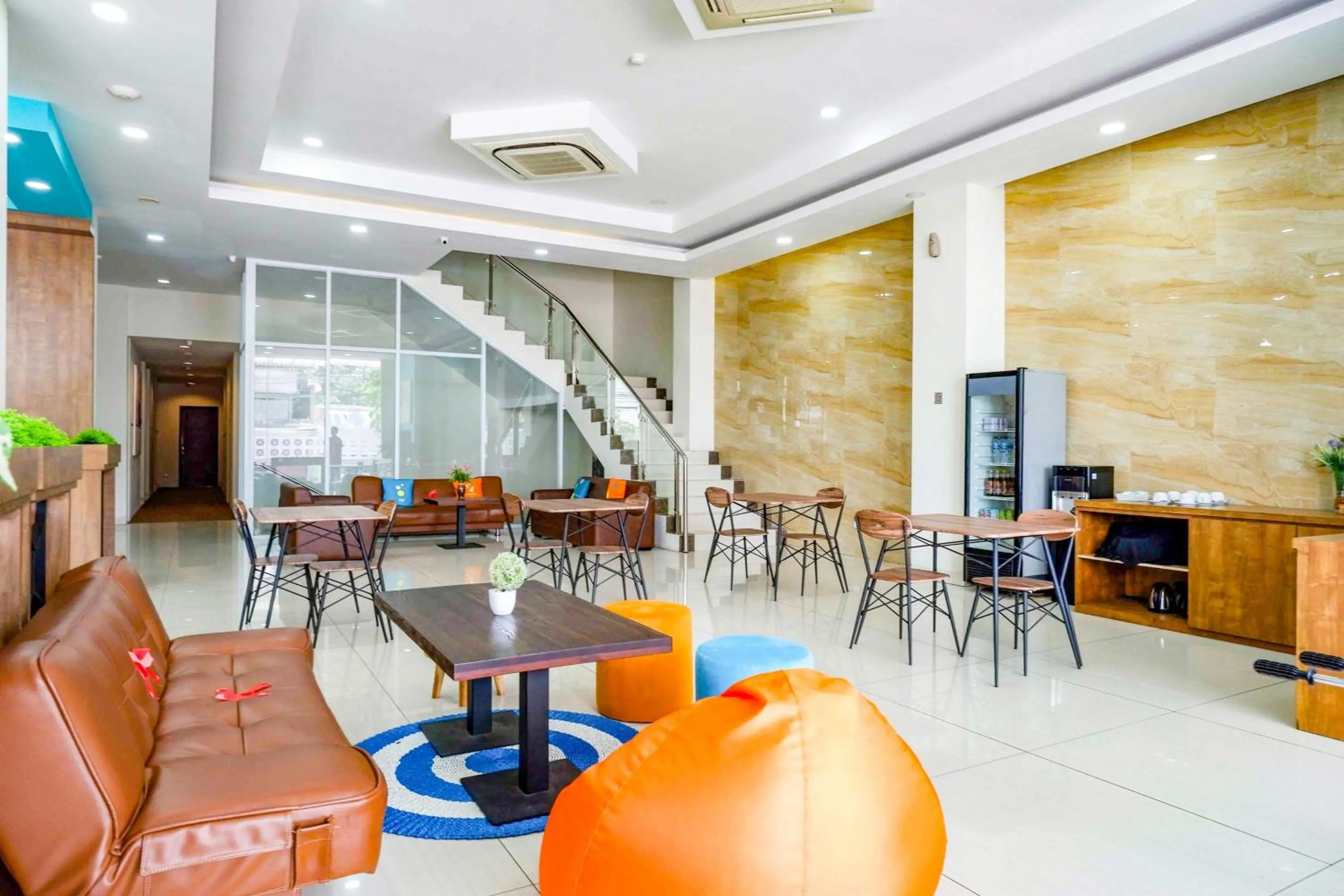 Seating area in Sans Hotel Nagari Malioboro