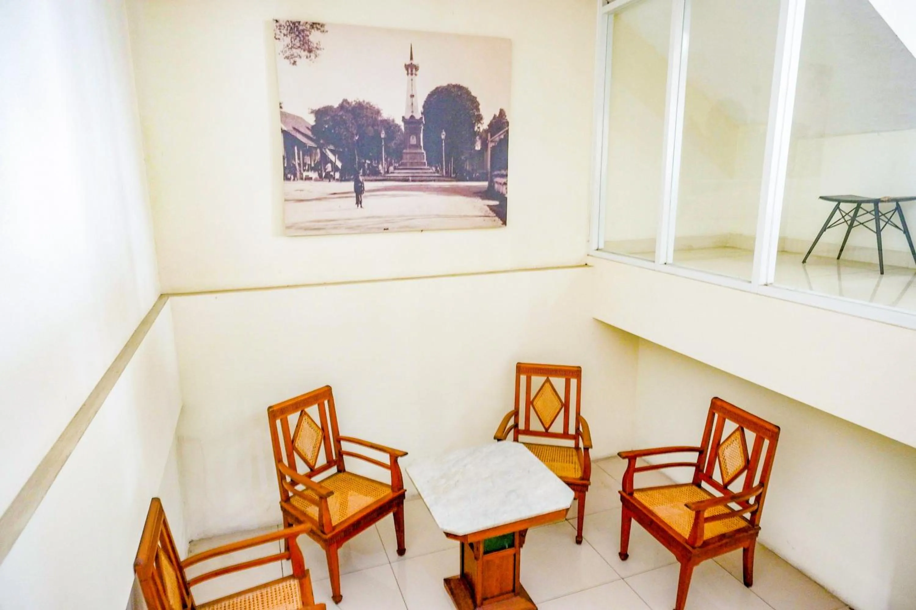 Seating area in Sans Hotel Nagari Malioboro