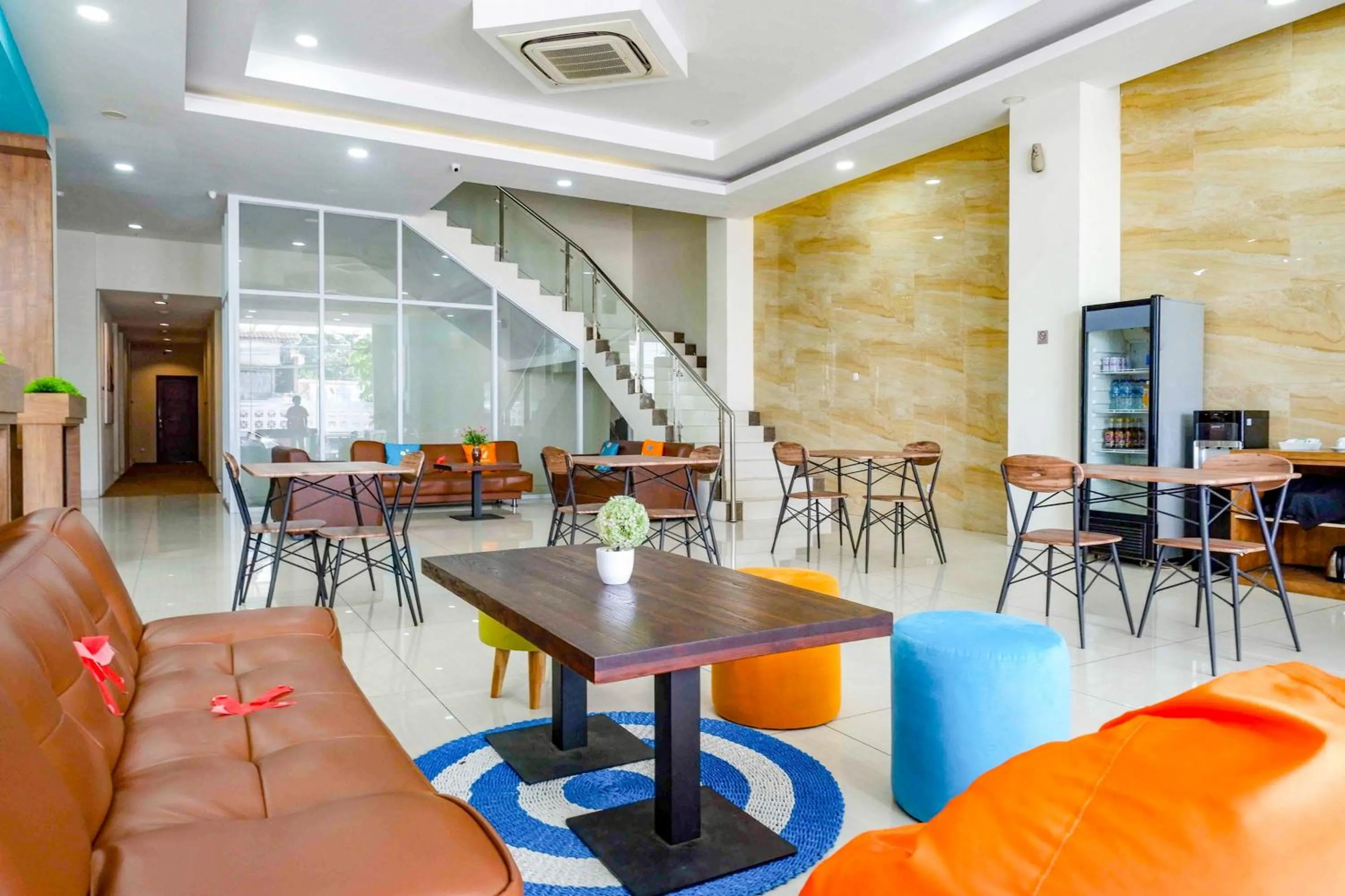 Seating area in Sans Hotel Nagari Malioboro