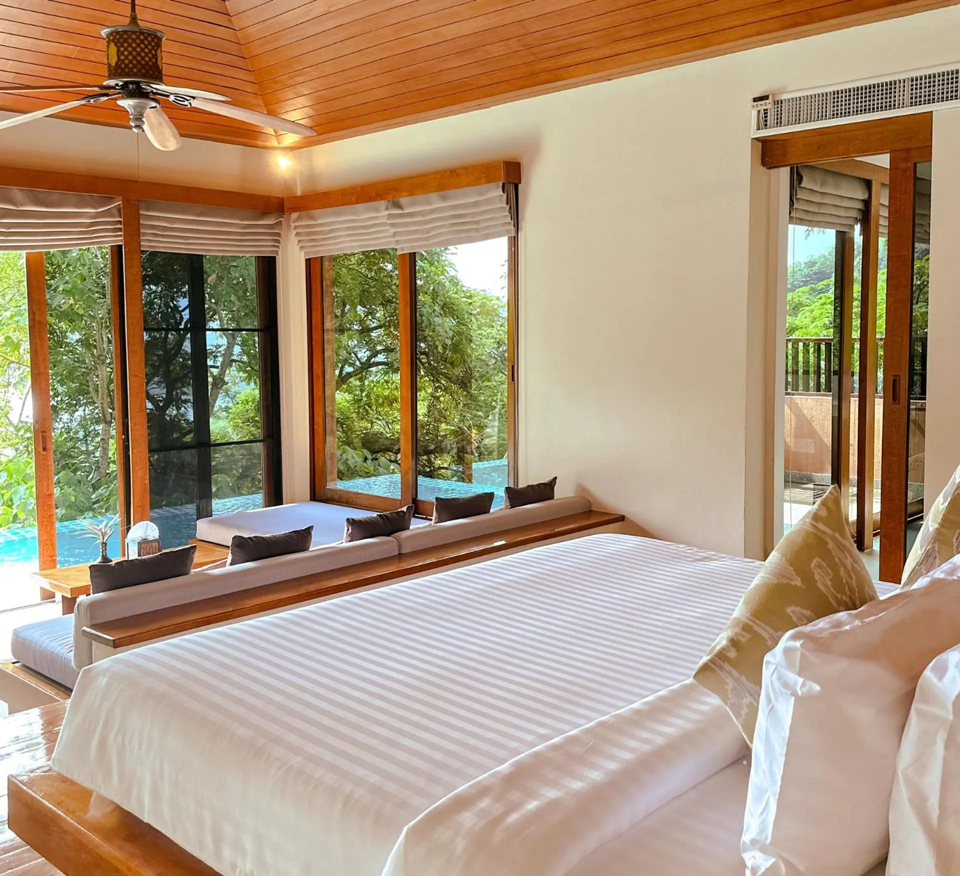 Bed in Korsiri Pool Villas