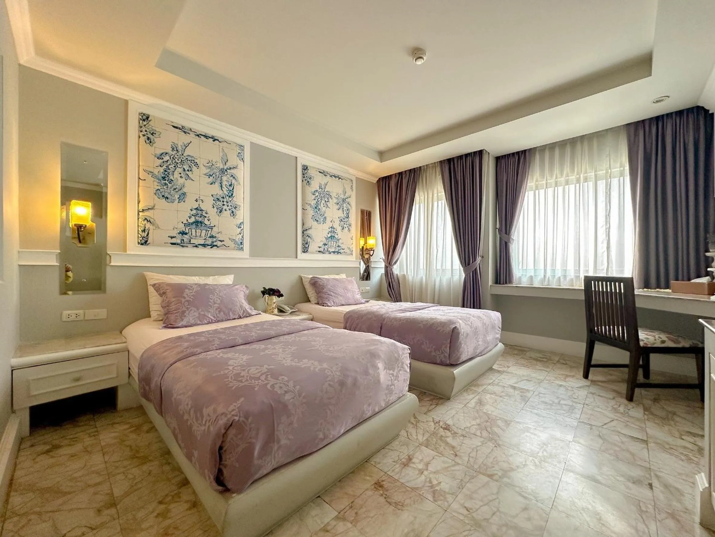 Bed in At Pingnakorn Nimman Hotel