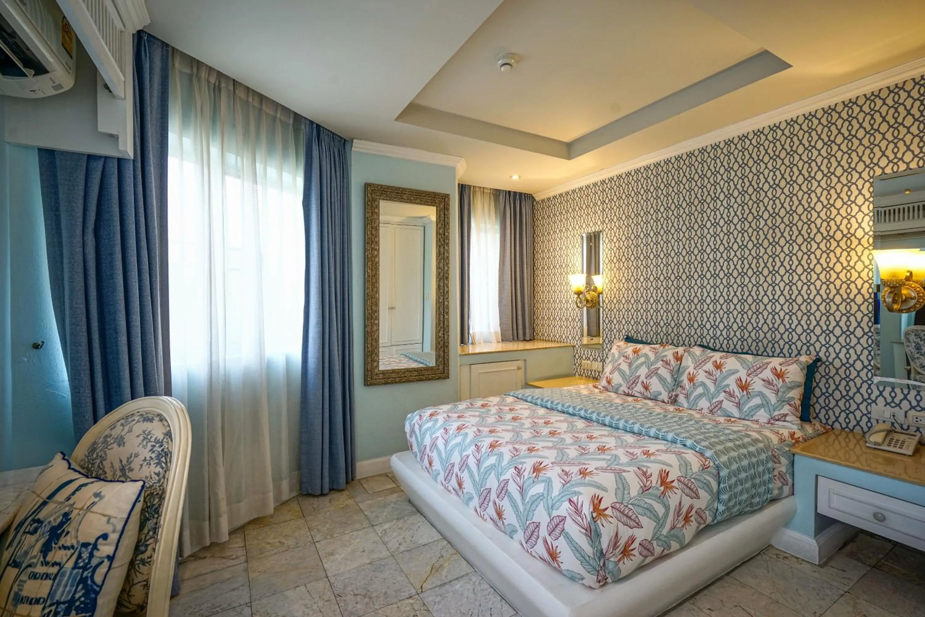 Bed in At Pingnakorn Nimman Hotel