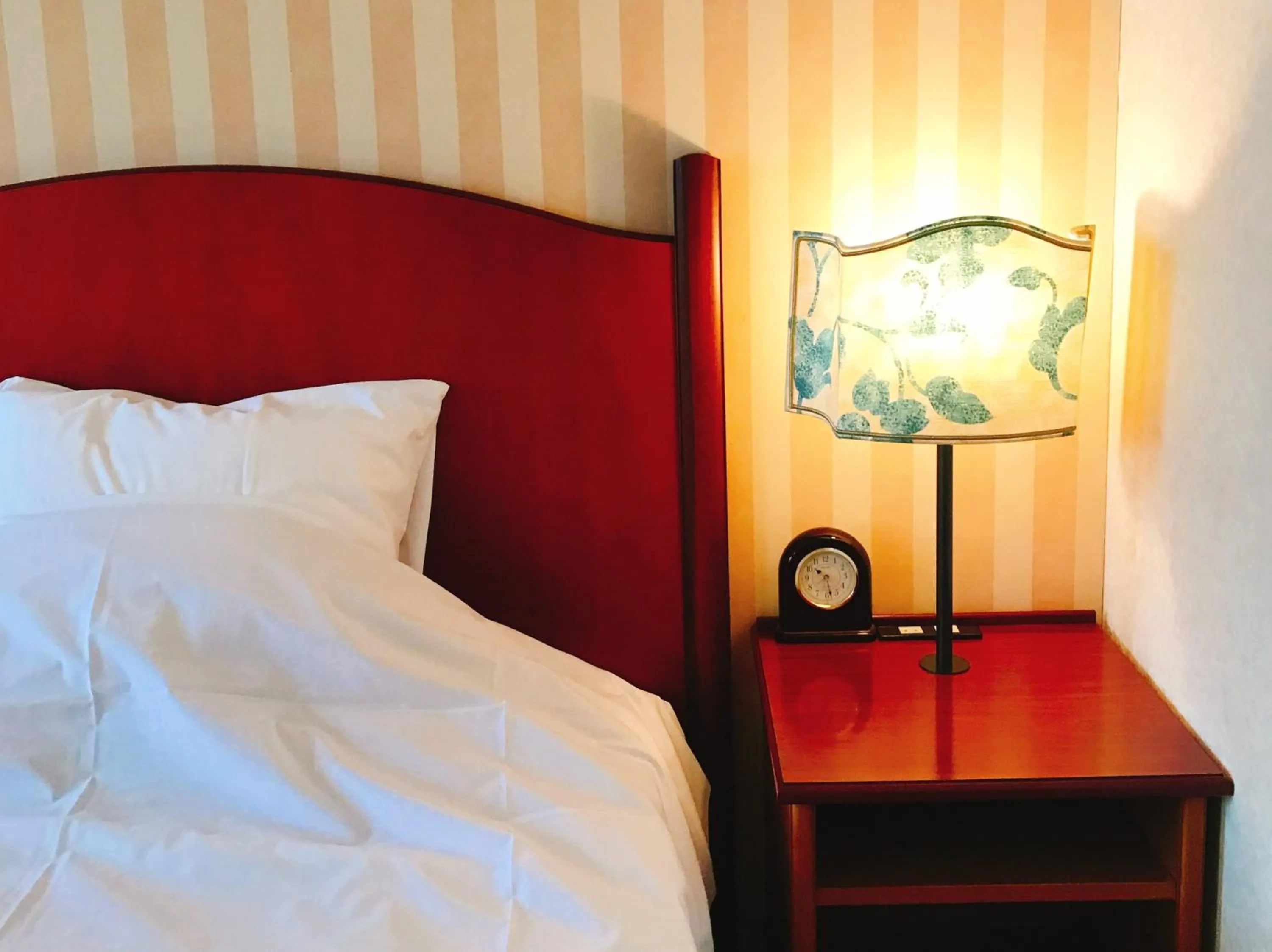 Bed in Kitabiwako Hotel Grazie