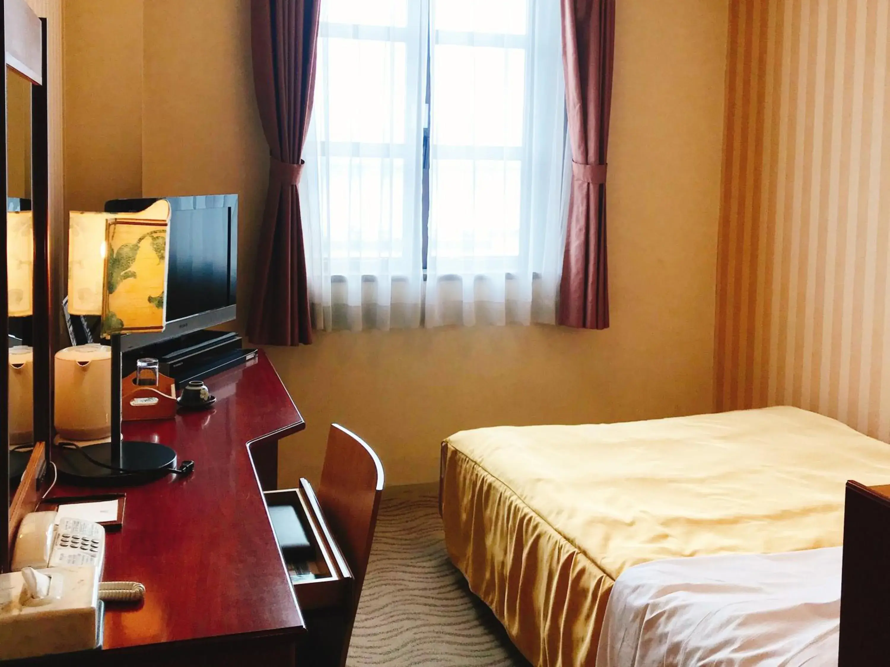 Bed in Kitabiwako Hotel Grazie Bed in Kitabiwako Hotel Grazie