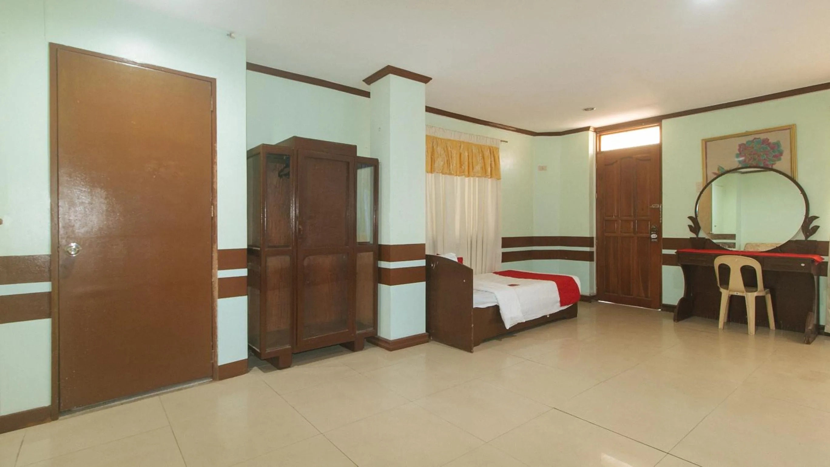 Bed in RedDoorz at Maanyag Pension House Mandaue