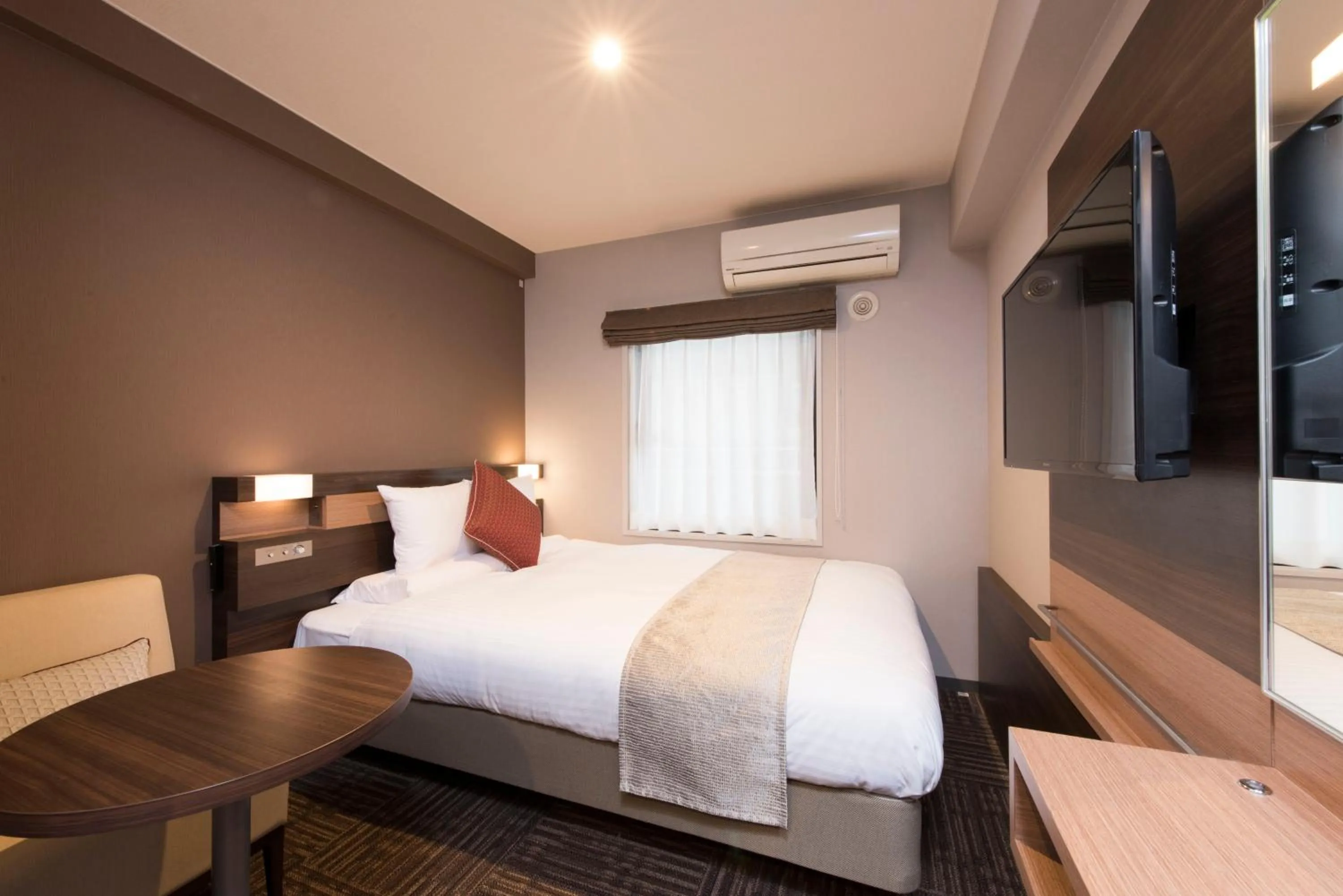 Bed in HOTEL MYSTAYS Gotanda