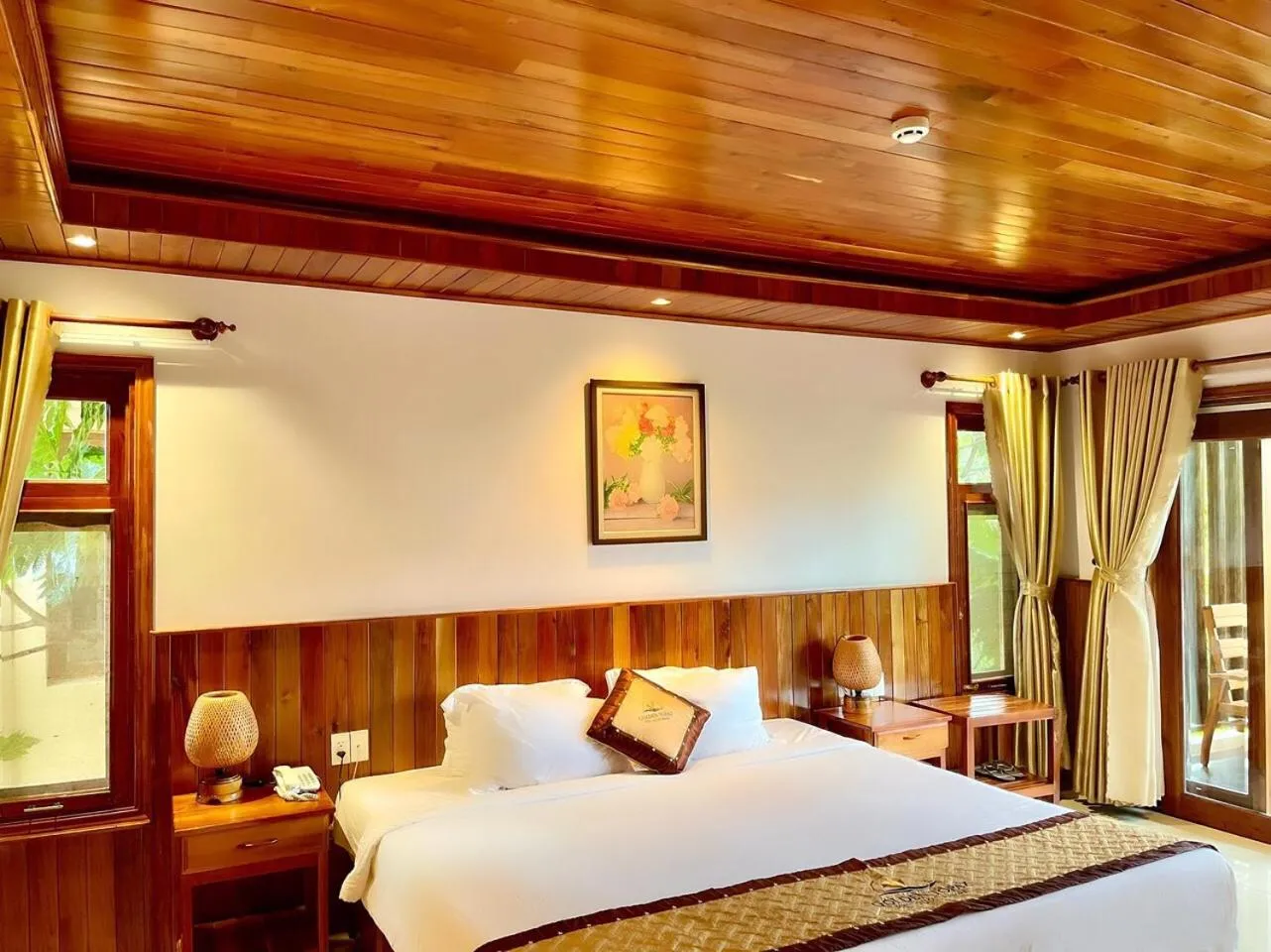 Living room, Bed in Golden Topaz Phu Quoc Resort