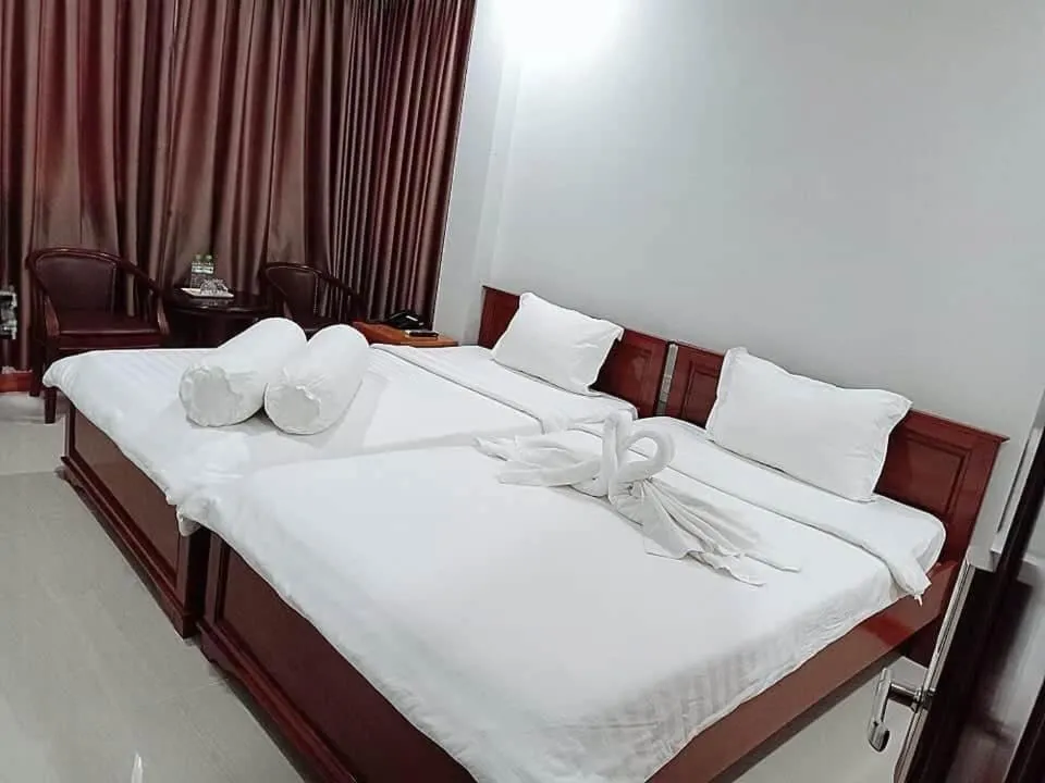 Bed in Rich Hotel