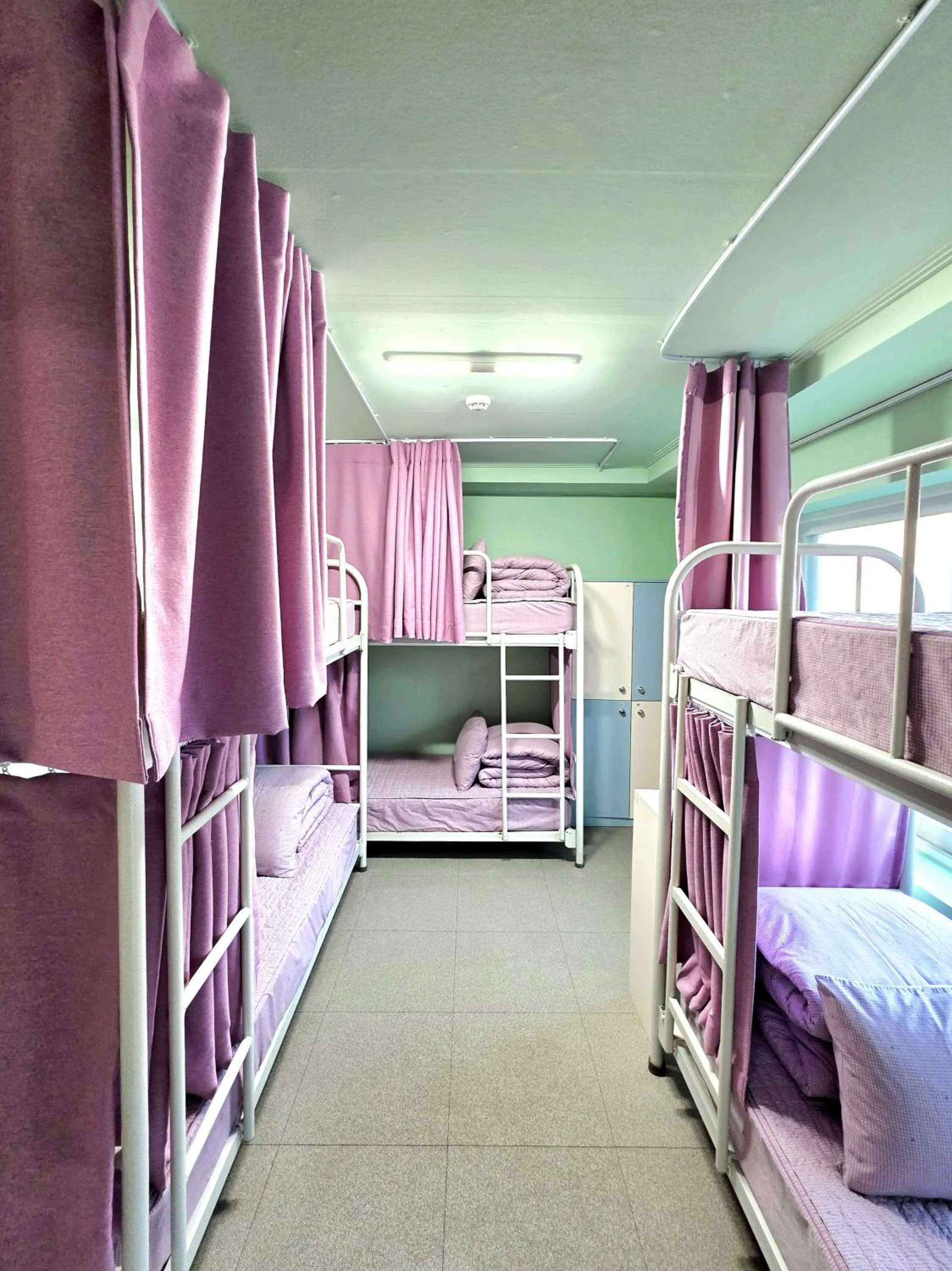 Bed in Happy Garden Guesthouse