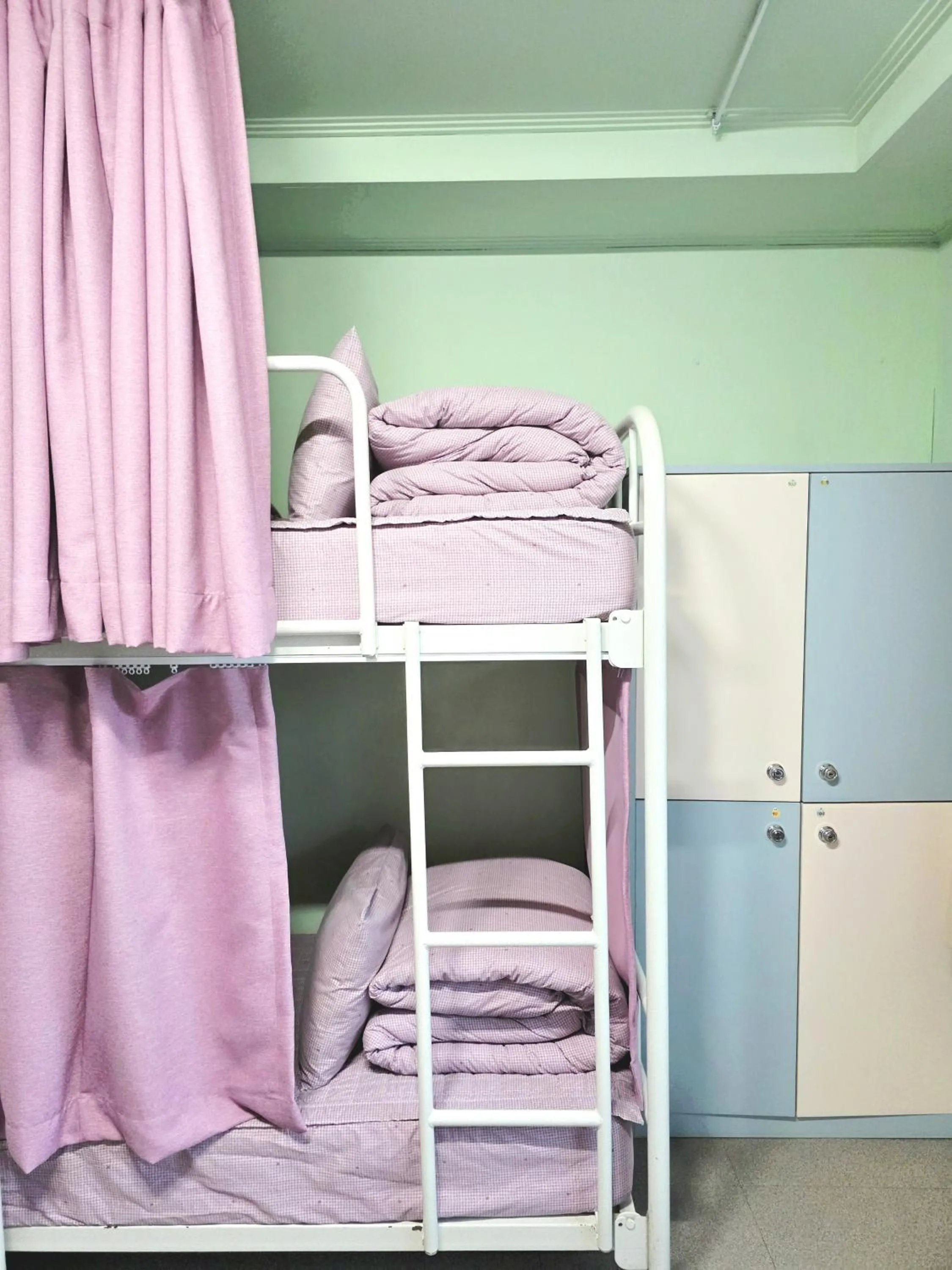 Bed in Happy Garden Guesthouse