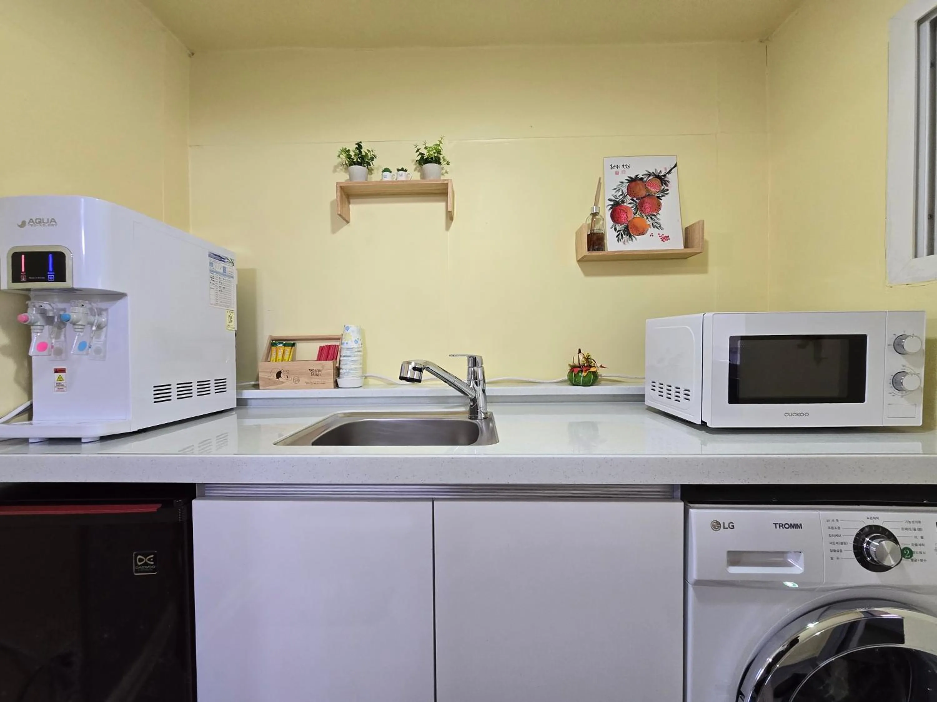 Kitchen or kitchenette in Happy Garden Guesthouse