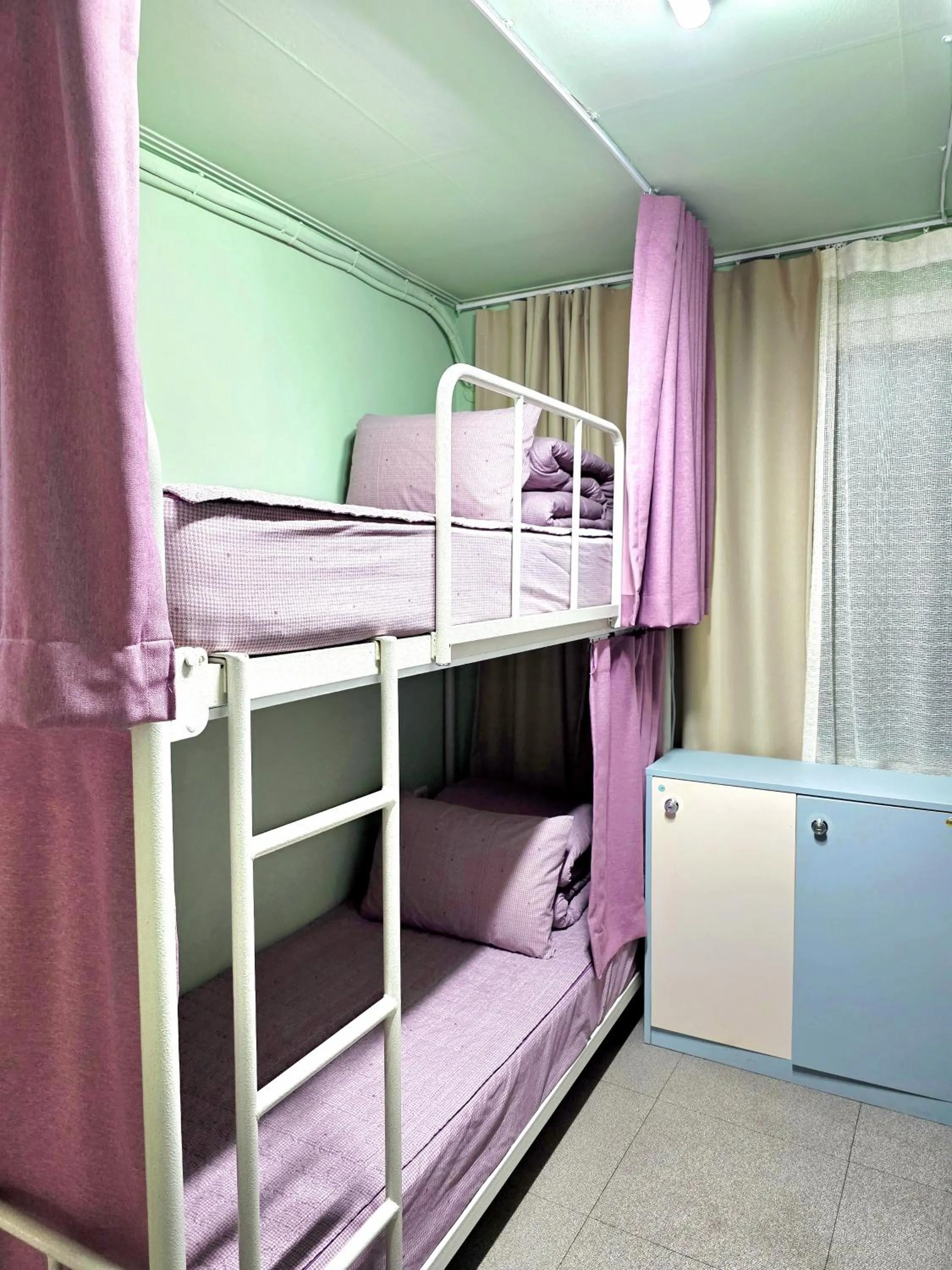 Bed in Happy Garden Guesthouse