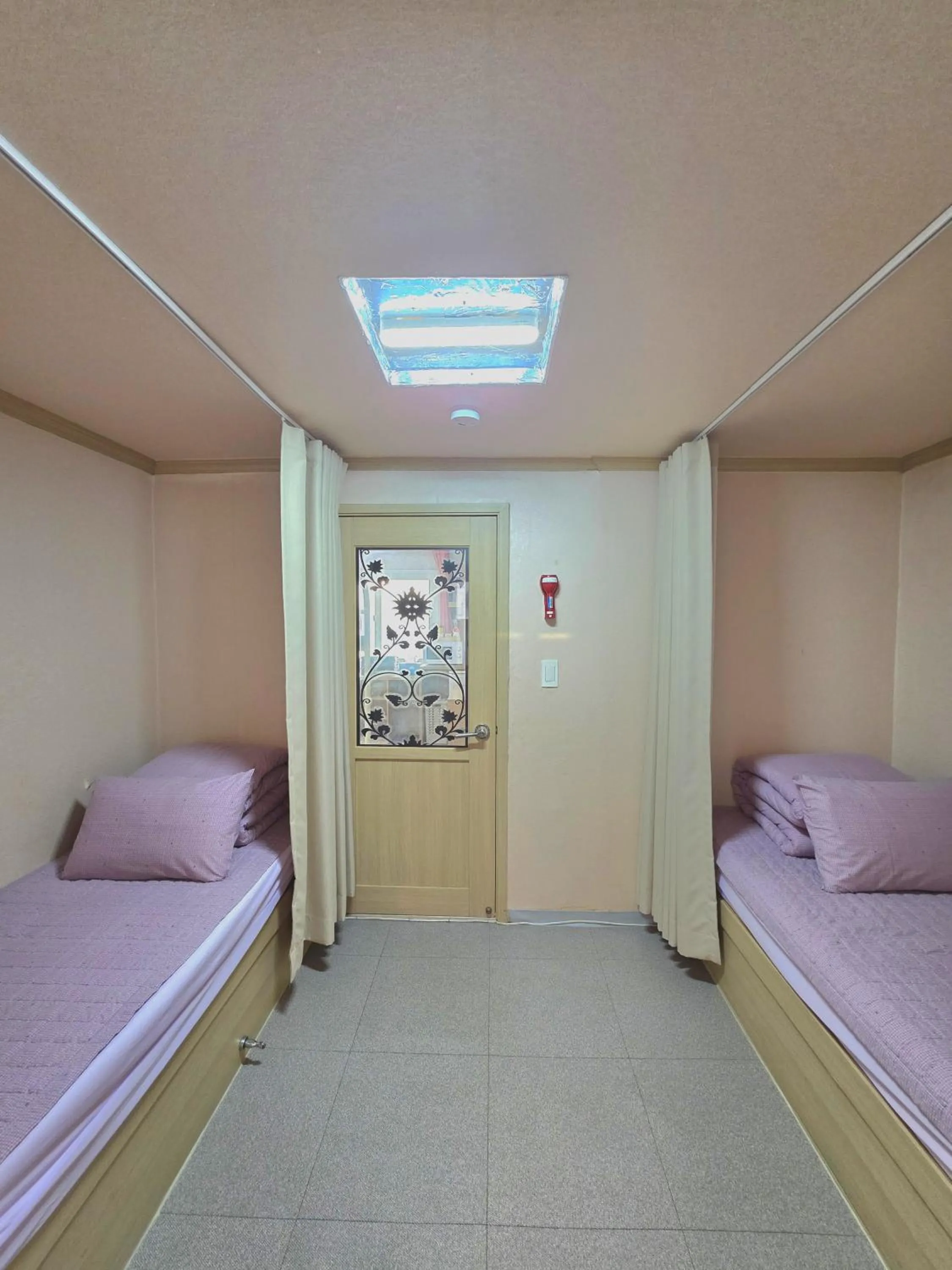 Bed in Happy Garden Guesthouse