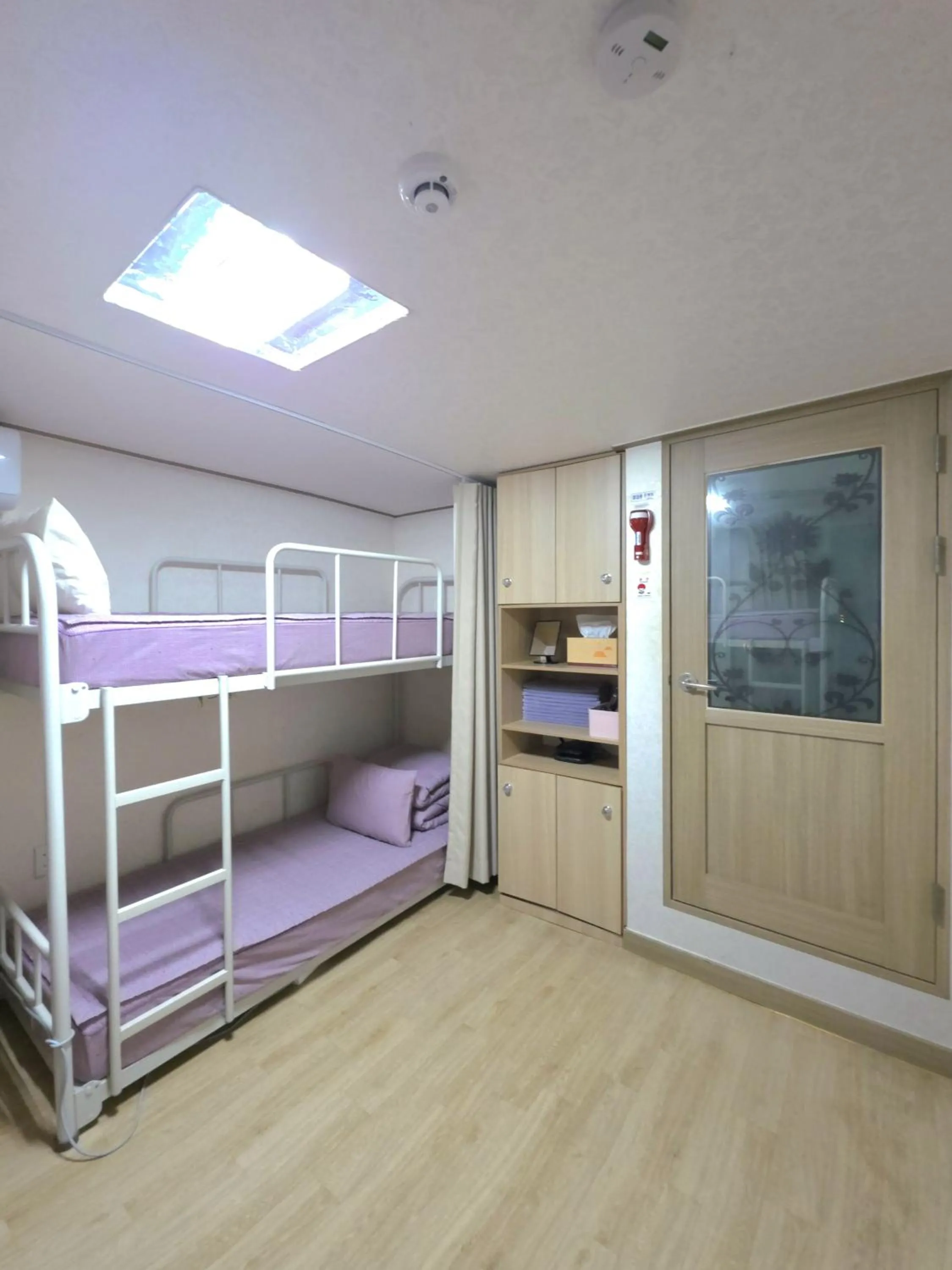 Bed in Happy Garden Guesthouse