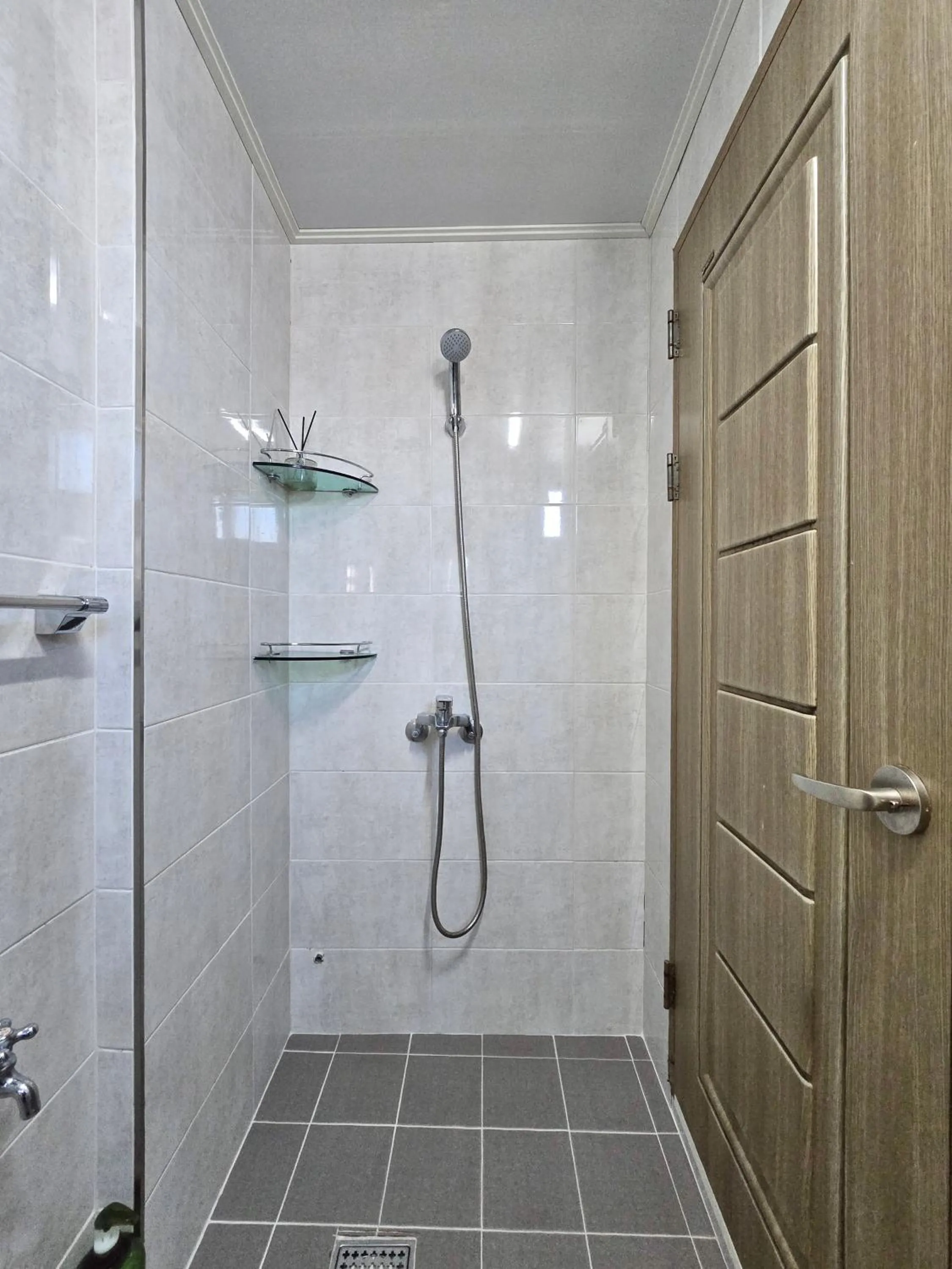 Shower in Happy Garden Guesthouse