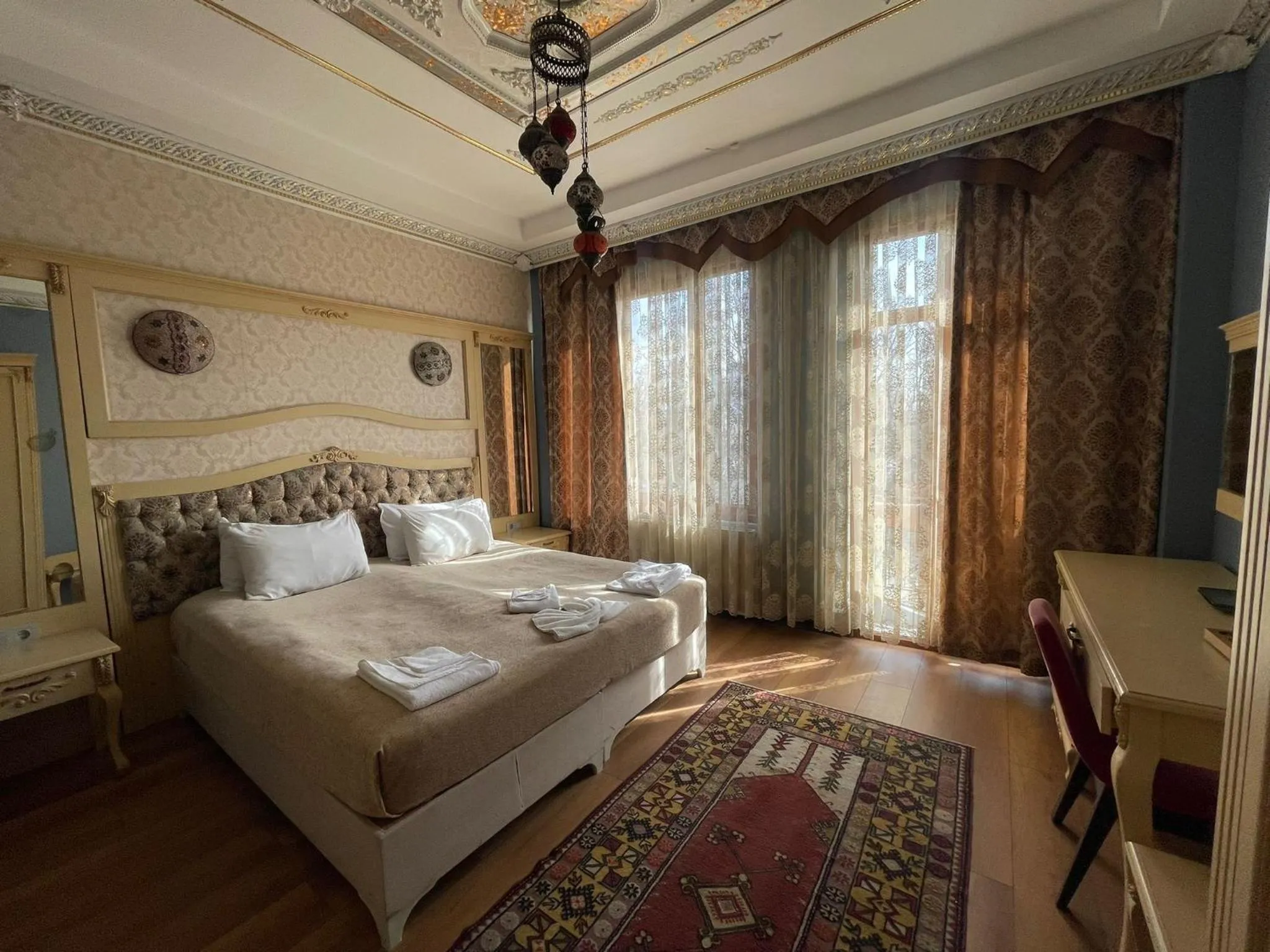 Bed in Optimist Hotel