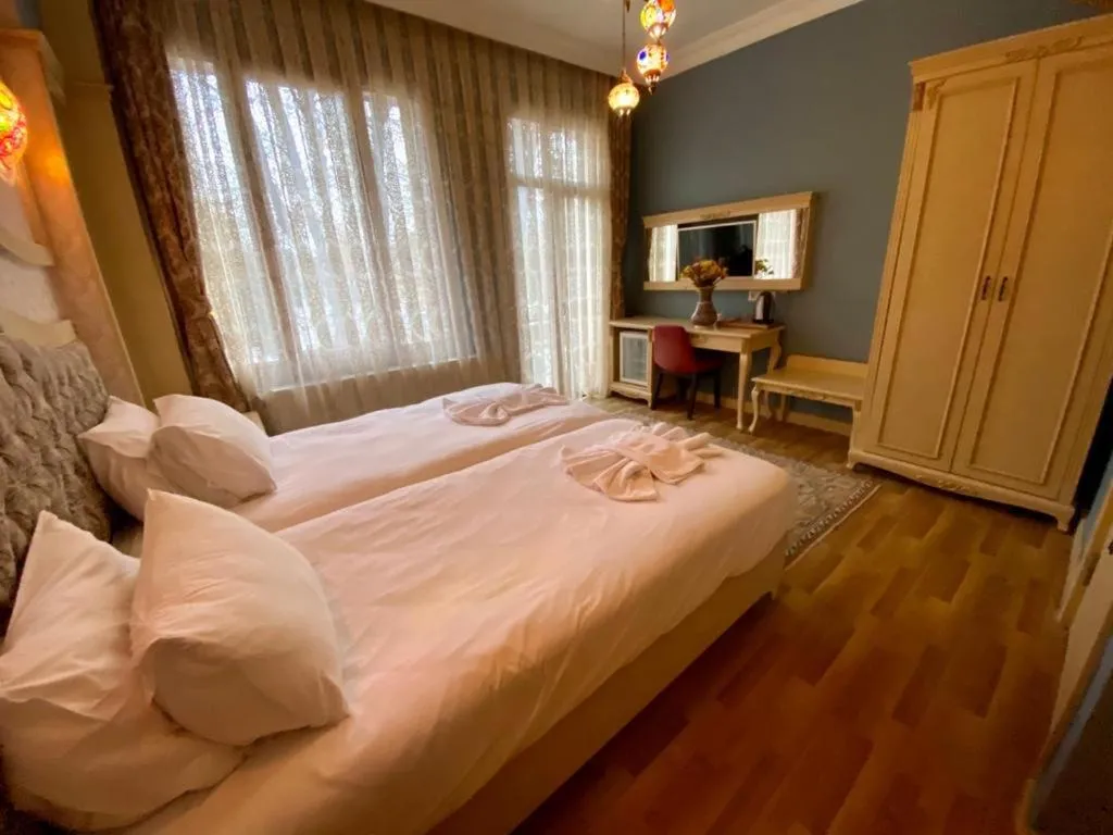 Bed in Optimist Hotel
