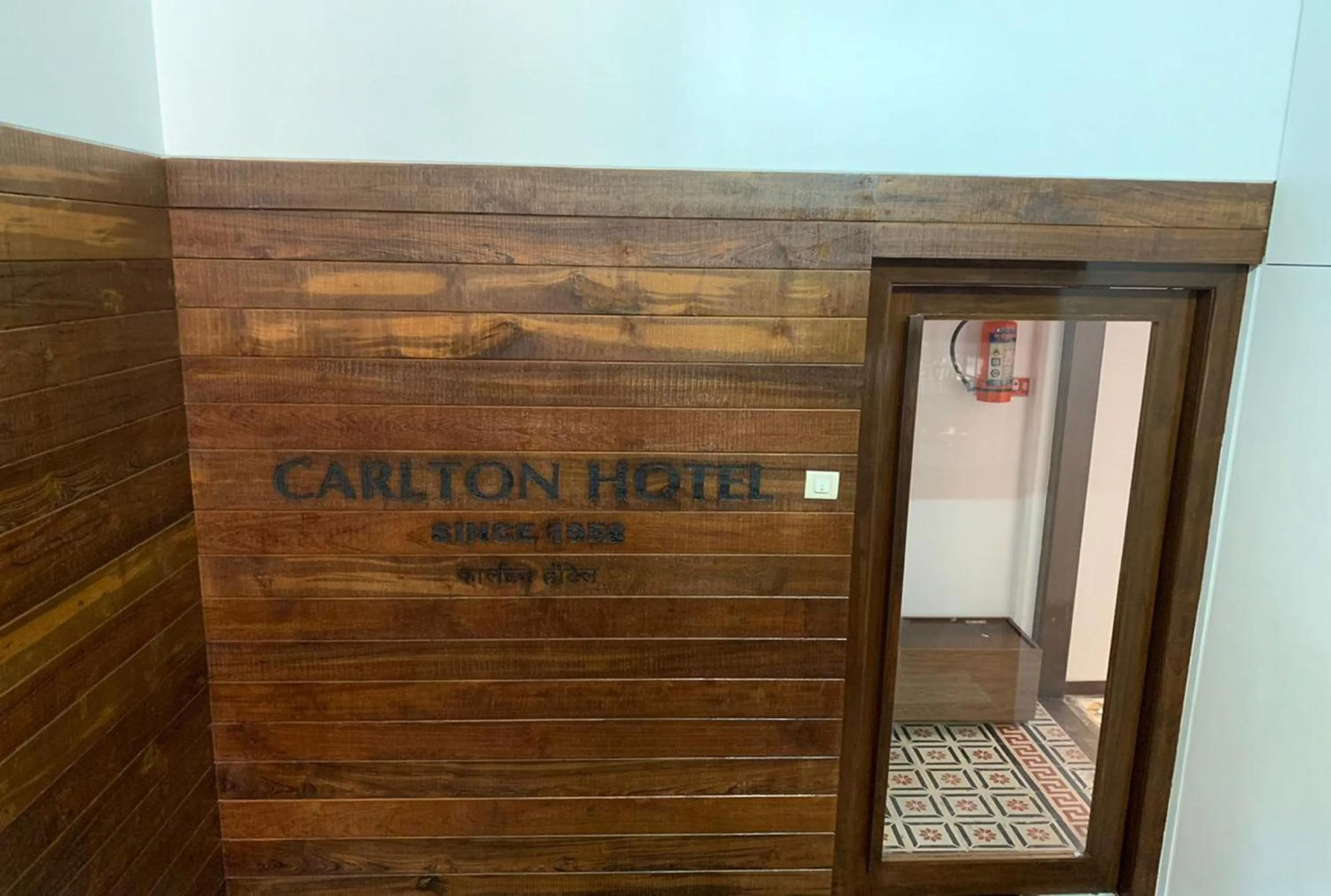 Property logo or sign in Carlton Hotel Mumbai - Behind Taj Mahal Palace Colaba Mumbai