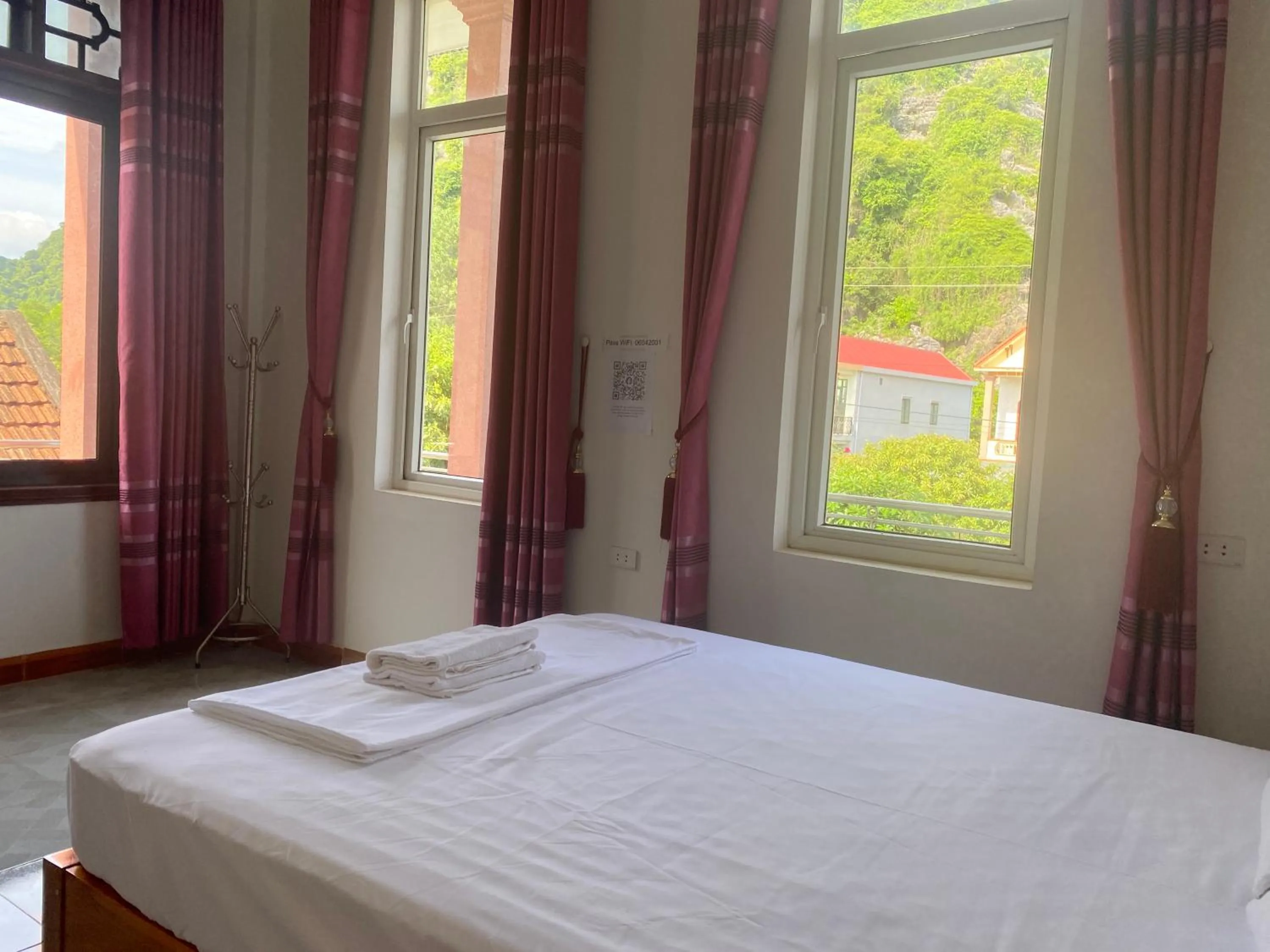 Photo of the whole room, Bed in Phong Nha - Tien's Cozy Homestay