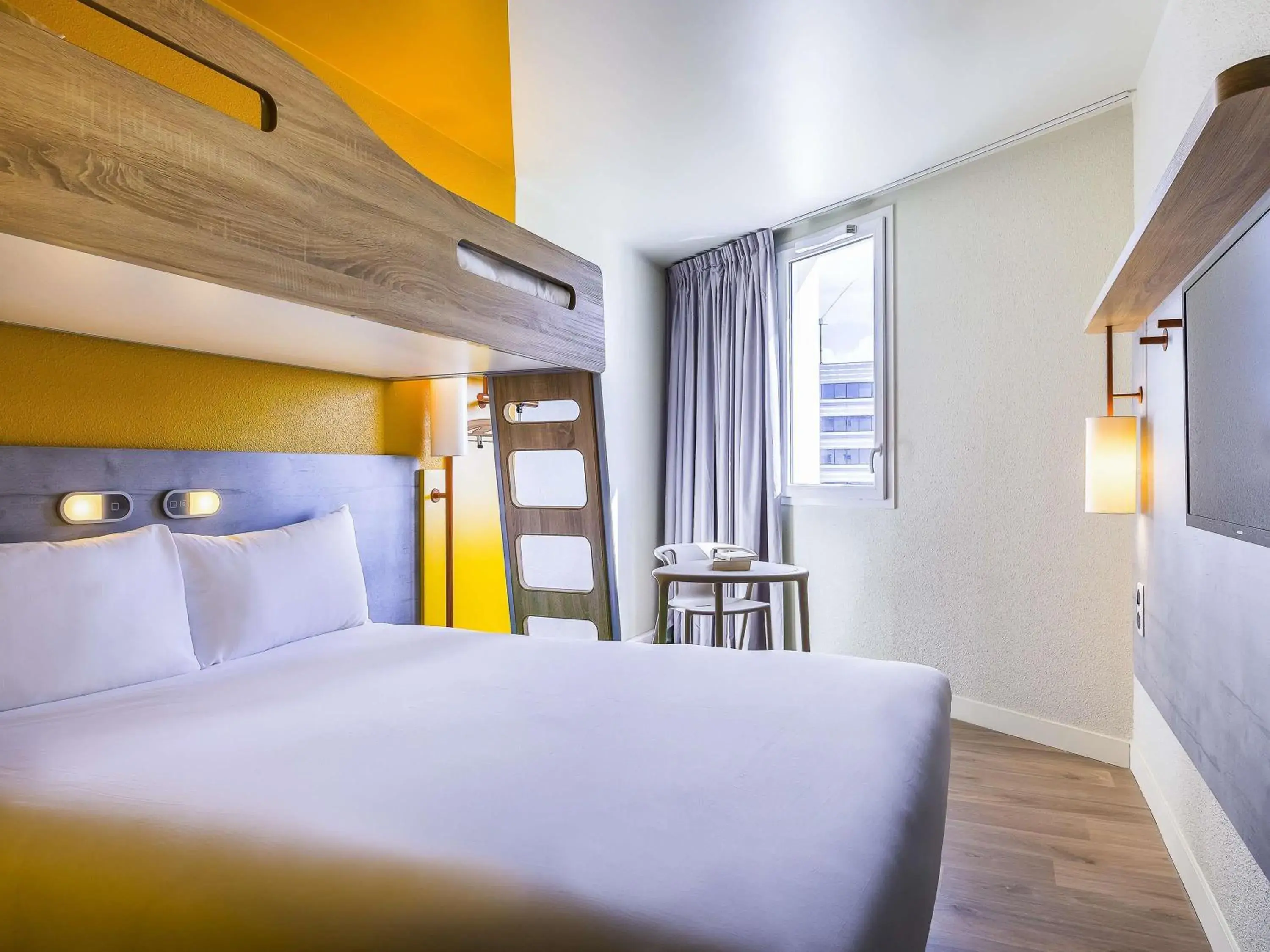 Bedroom, Bed in ibis budget Paris Gennevilliers Bedroom, Bed in ibis budget Paris Gennevilliers
