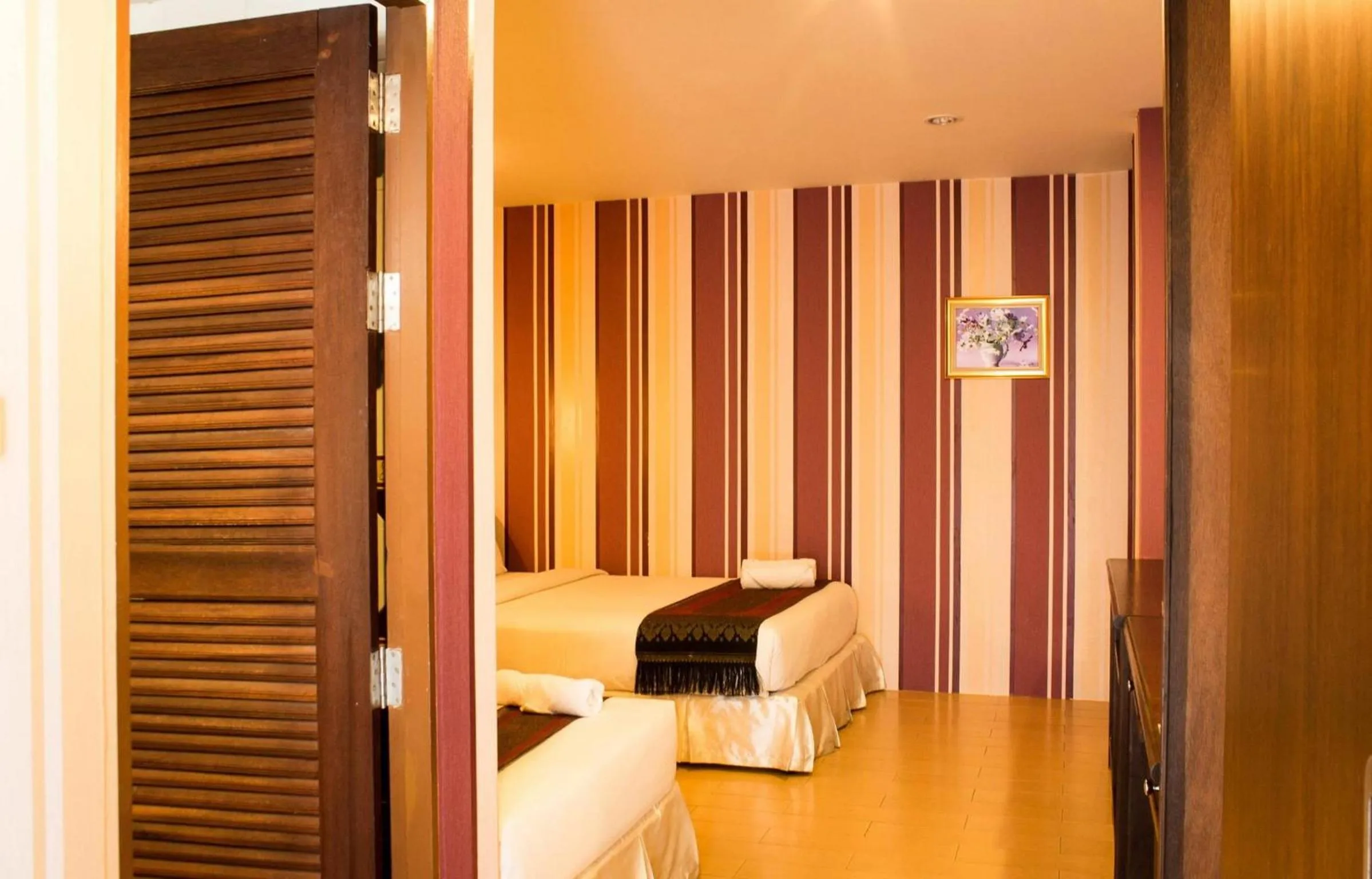 Photo of the whole room, Bed in Natural Samui Hotel