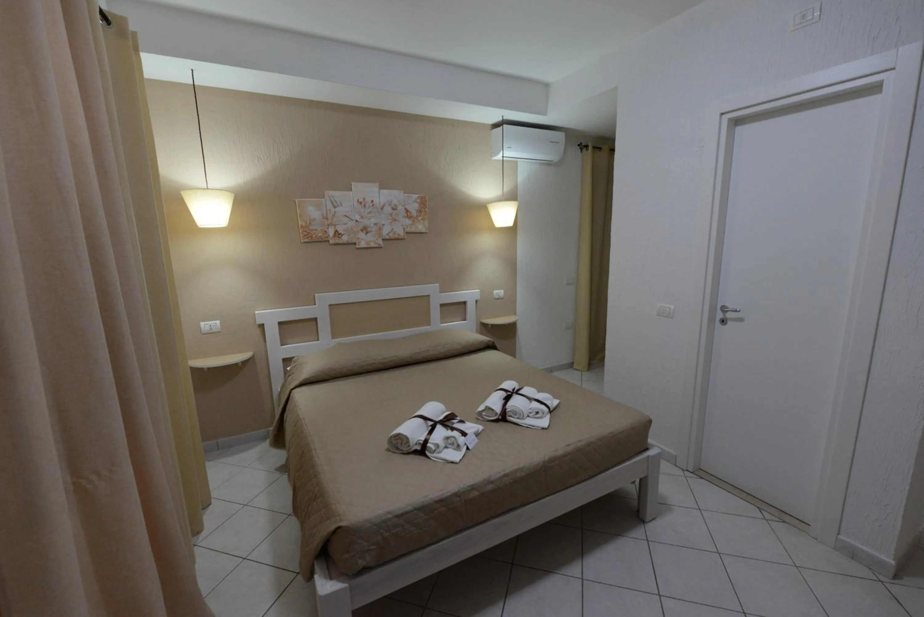 Bedroom, Bed in Villa Saturno