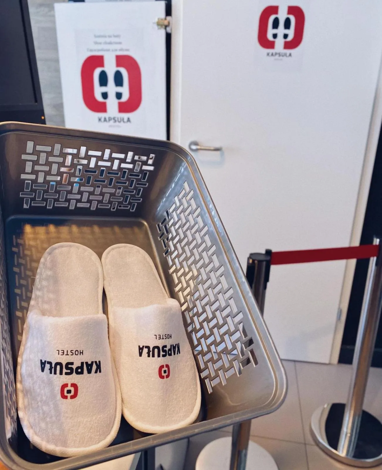 Property logo or sign in Kapsuła Hostel Warszawa